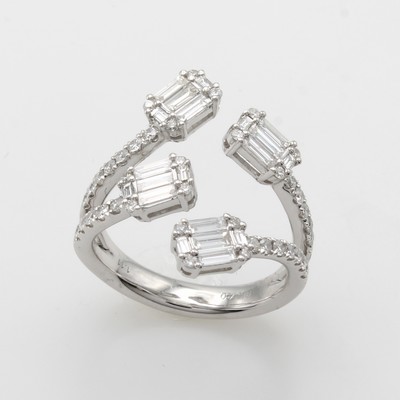27061011a - Ring mit Diamanten und Brillanten, WG 750/ 000, Diamantbaguettes zus. ca. 0.68 ct u. ...