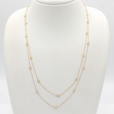 27061020a - Endlose Kette mit Brillanten, GG 750/000, 37 Brill. in Zargenfassungen zus. ca. 2.65 ct ...