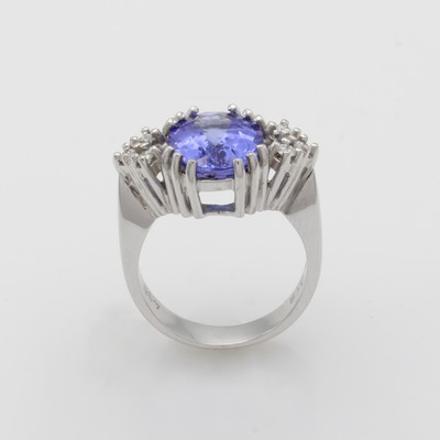 27061053a - Ring mit Tansanit und Brillanten, WG 585/000, ovaler Tansanit ca. 4.98 ct, 6 Brill. zus. ...