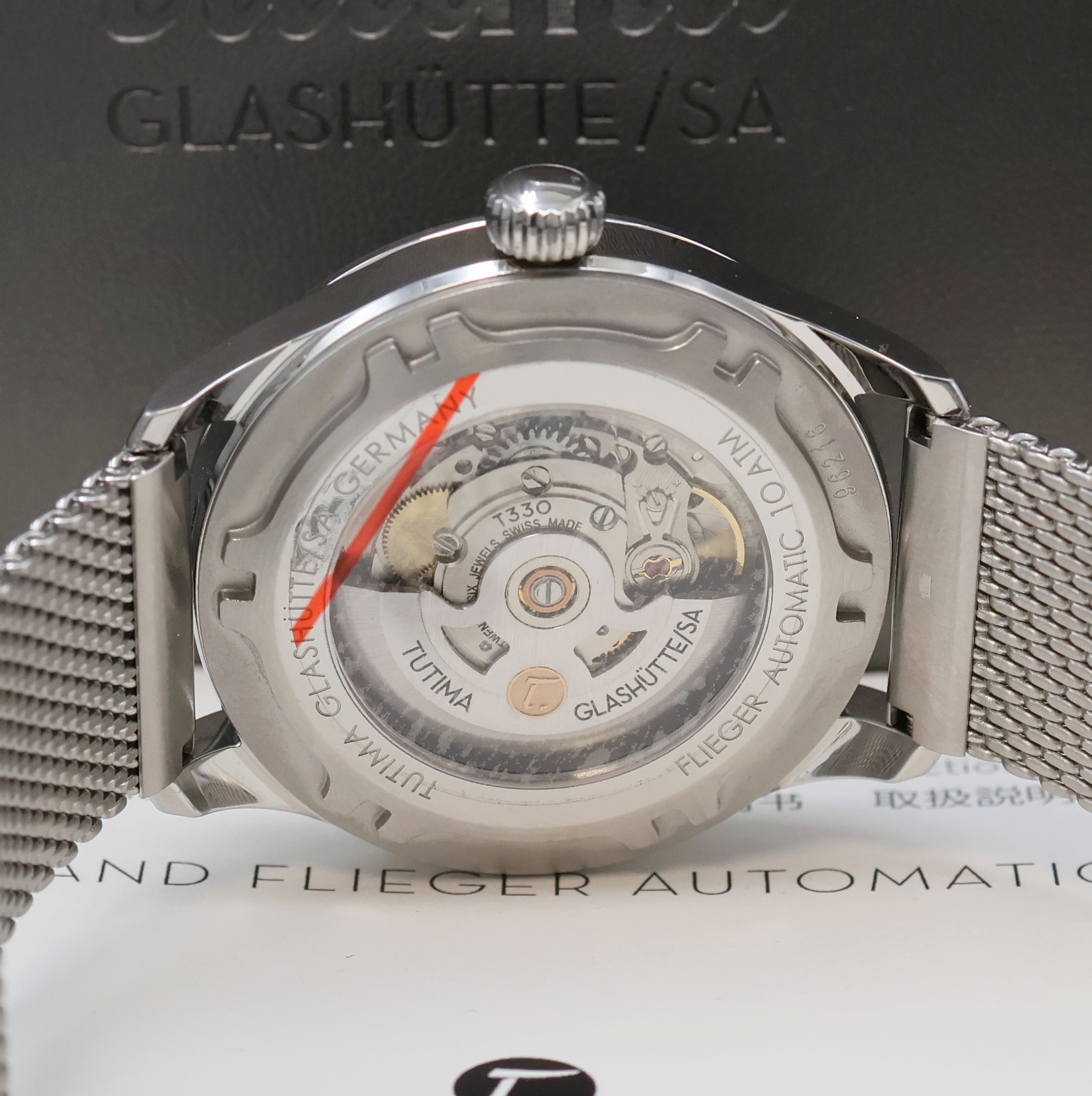 Detail e: TUTIMA Grand Flieger Herrenarmbanduhr in Stahl Referenz 6105-24, Deutschland verk. lt. beil. Pap. 09/2023, Automatik, beids. vergl. Geh. inkl. orig. ...