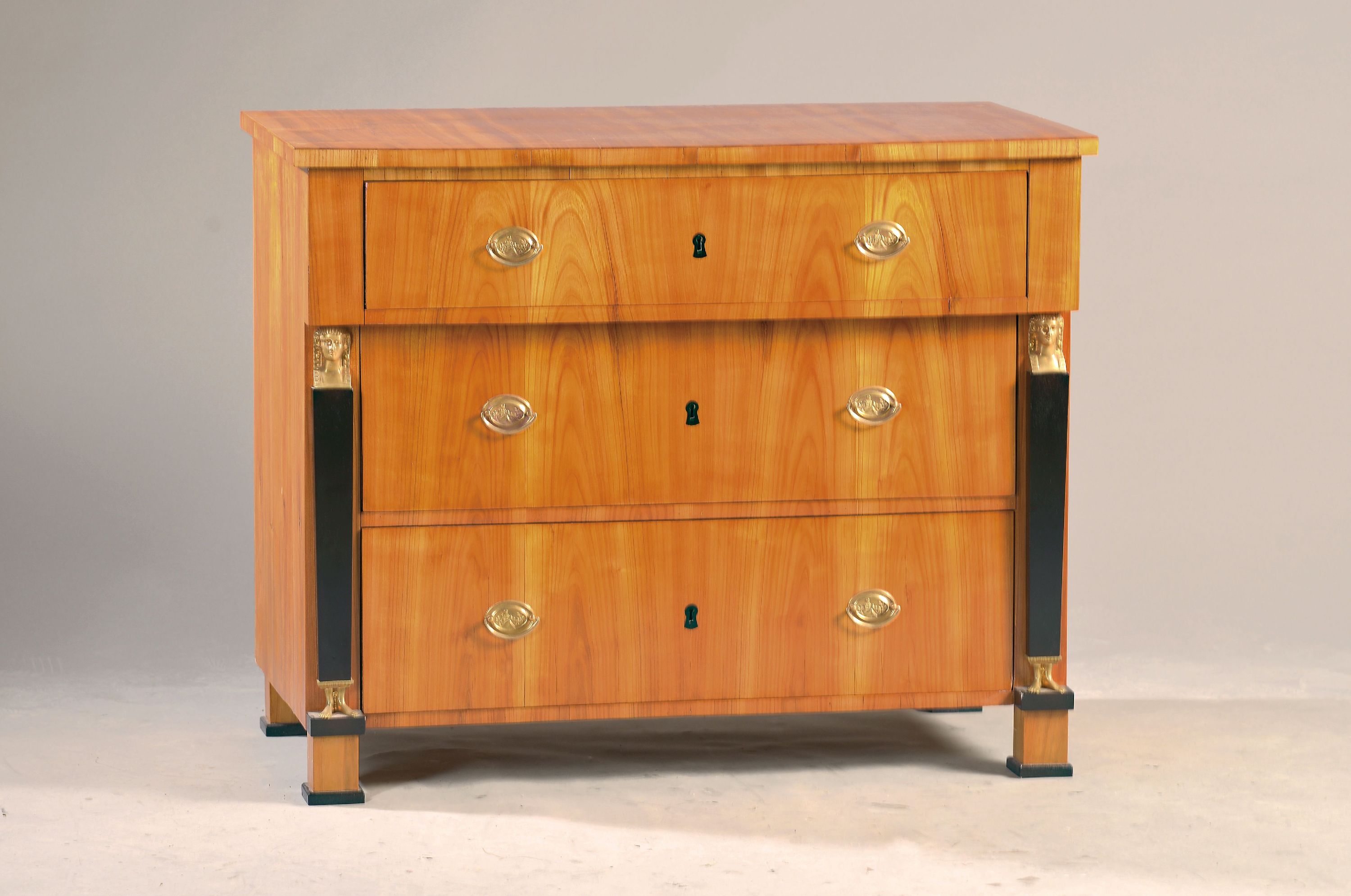 Image 27061224 - Chest of drawers in Empire style, 19th century, cherry tree veneer, 3 drawers, lavishly ...