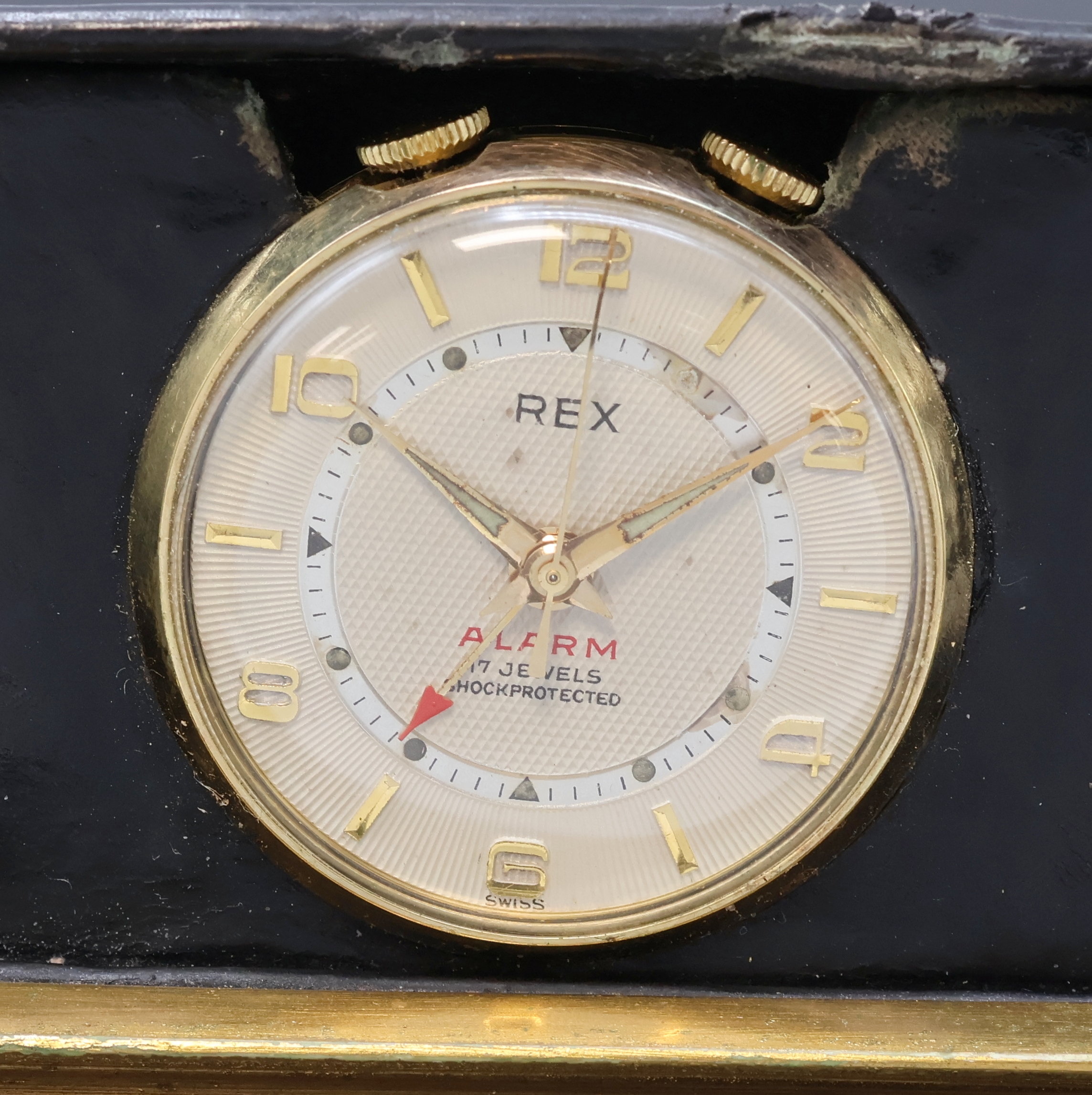 Detail a: REX Reisewecker in Hülle in Form eines Buches, Schweiz um 1960, Handaufzug, verg. Geh., Werk unter Staubschutz, silb. guill. Zifferbl. m. gold. ...