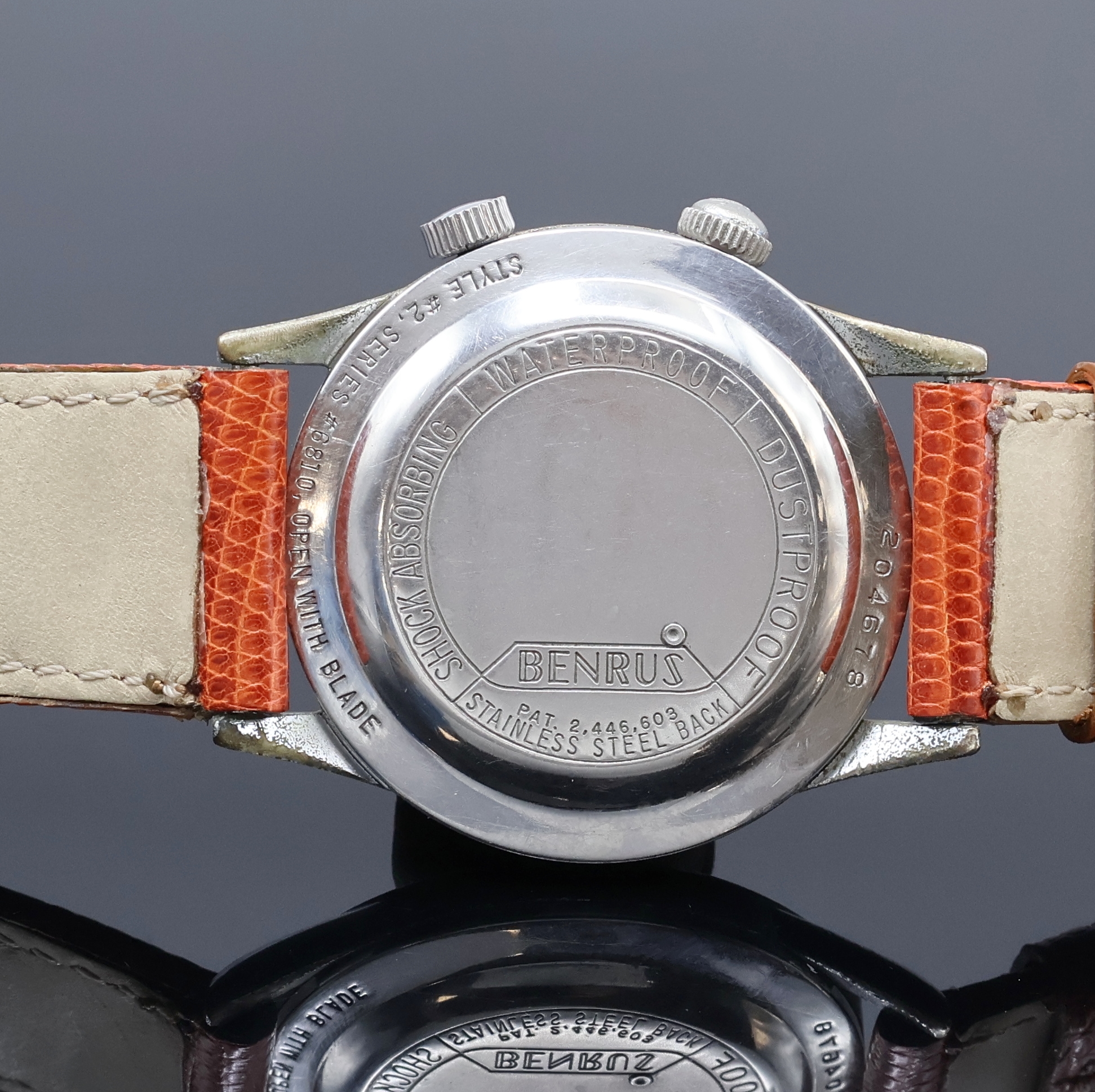 Detail c: BENRUS Armbandwecker, Schweiz um 1960, Handaufzug, verchr. Geh., Krone b. 2 f. Weckzeit, Krone b. 4 f. Zeigerstellung u. Aufzug, silb. Zifferbl. ...