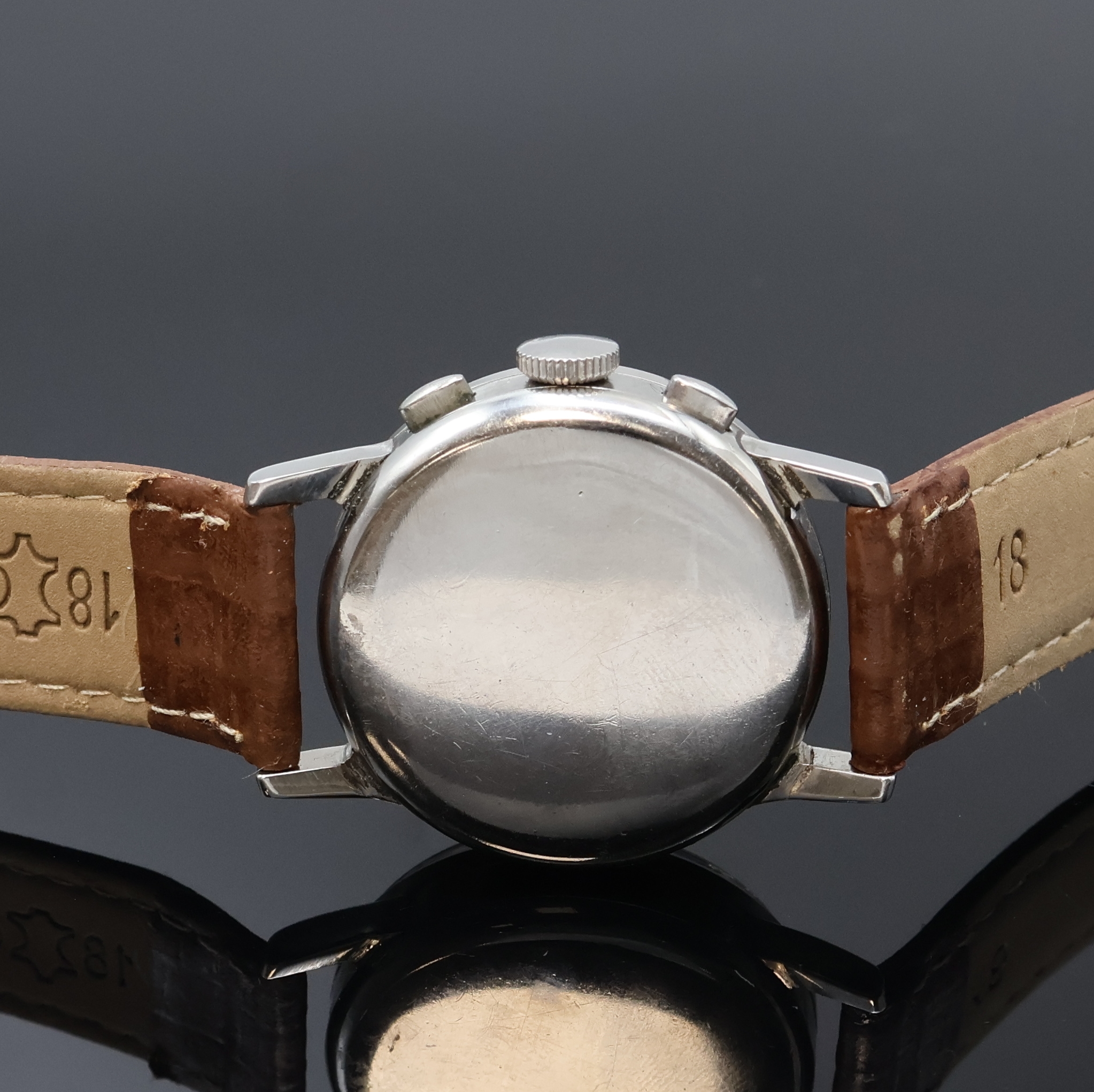 Detail c: GLYCINE Armbandchronograph mit Schaltrad in Stahl, Schweiz um 1940, Handaufzug, Boden u. Glasrand aufgedr., schön erhaltenes schwarzes ...