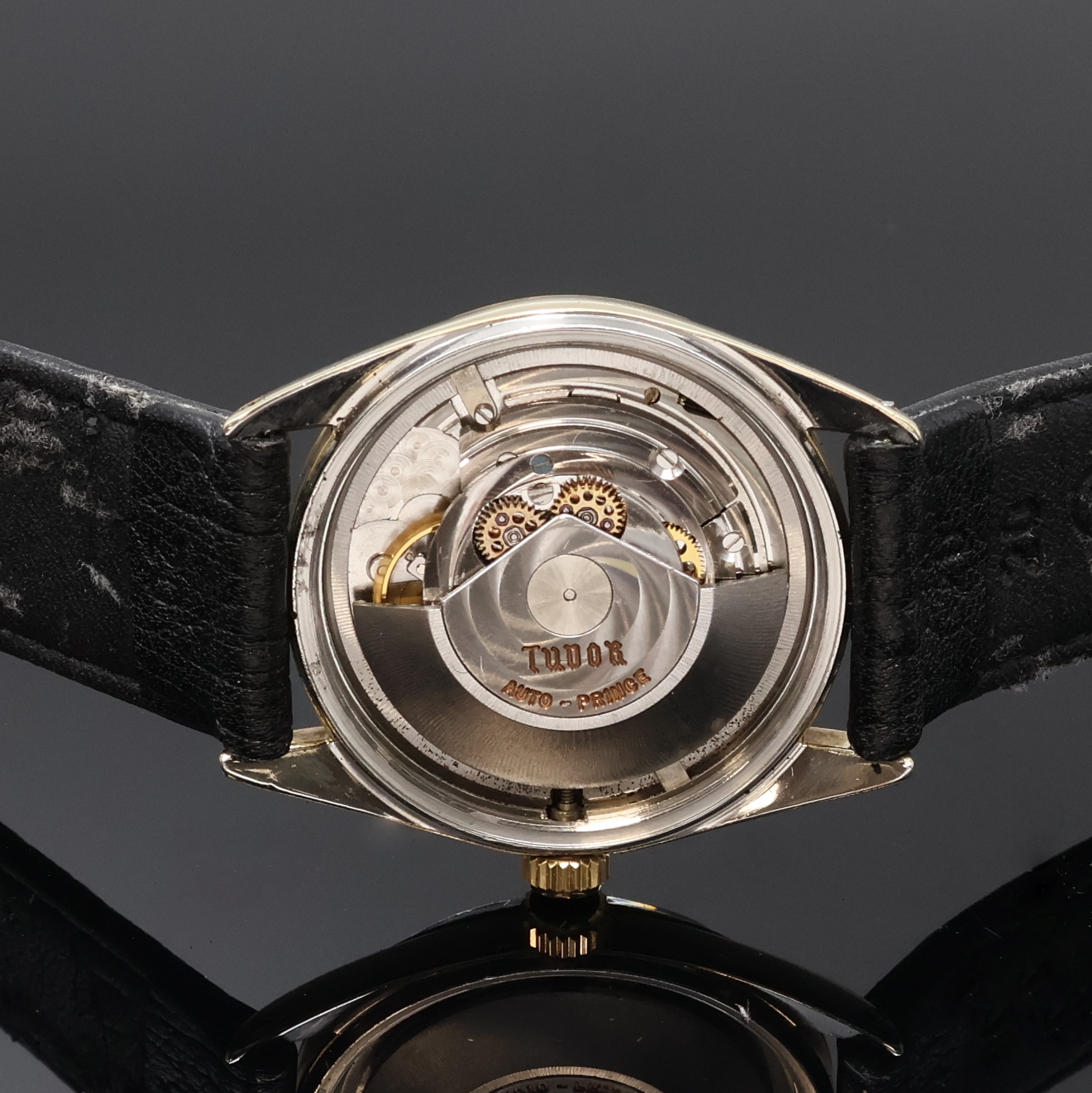 Detail d: TUDOR Oysterdate Herrenarmbanduhr mit Goldhaube, Schweiz um 1960, Automatik, Boden u. Krone verschr., schön erhaltenes schwarzes Rose Zifferbl. m. ...
