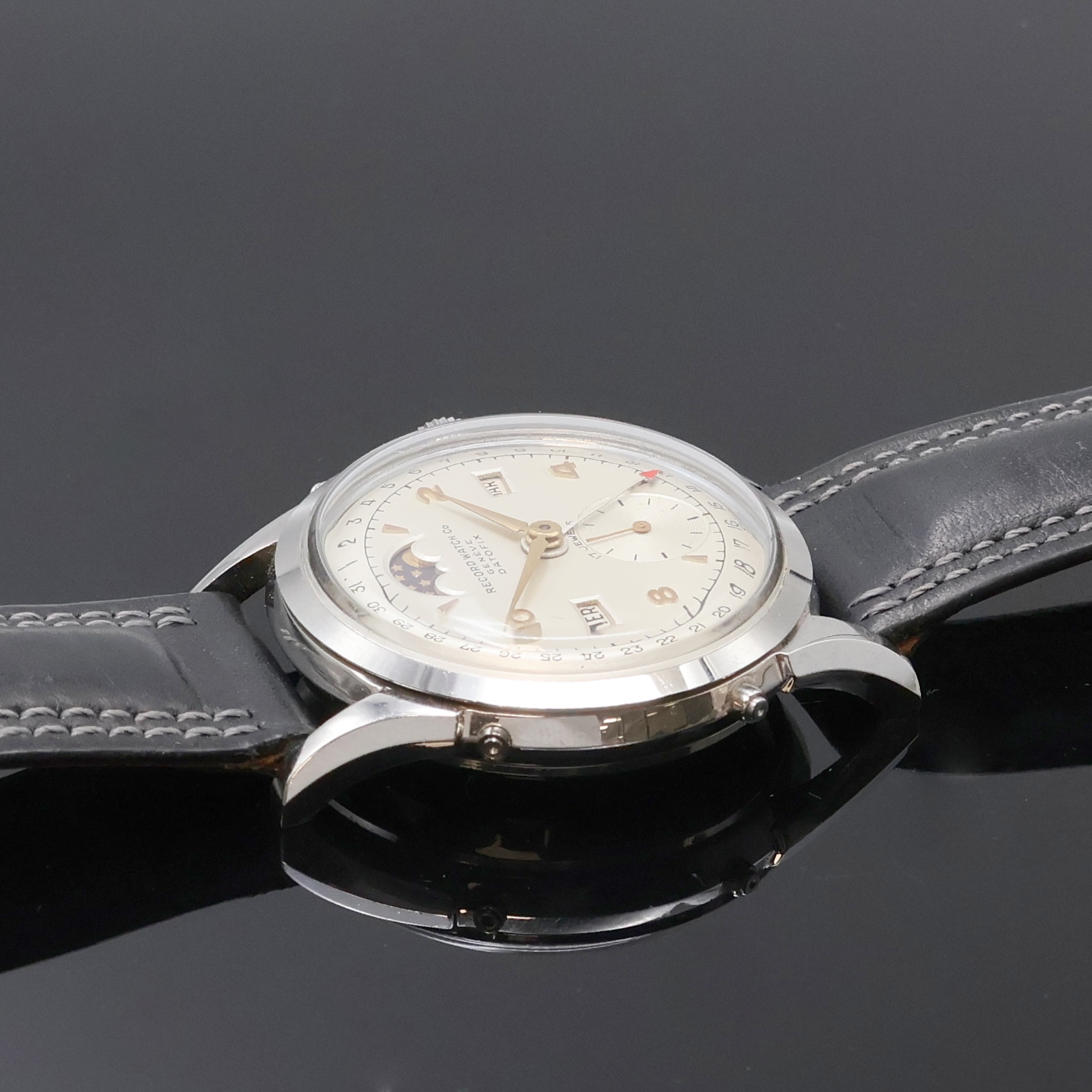 Detail c: RECORD WATCH Datofix Herrenarmbanduhr mit Vollkalender und Mondphase, Schweiz 1940er Jahre, Handaufzug, Edelstahlgeh., Boden verschr., Korrekturdr. ...