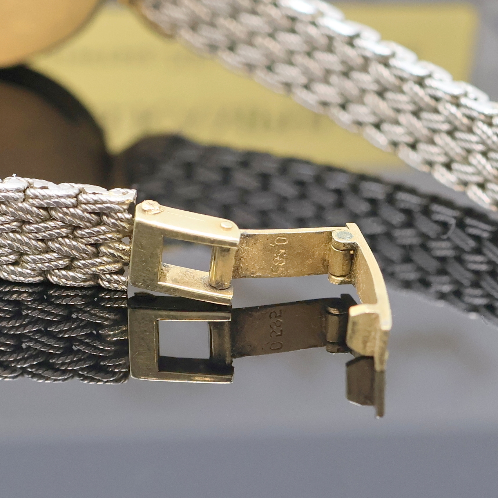 Detail f: GUEPARD Damenarmbanduhr in GG 585/000 mit Diamanten, Schweiz verk. lt. beil. Garantie 12/1986, quarz, geflochtenes WG 585/000 Band, Lünette sowie ...