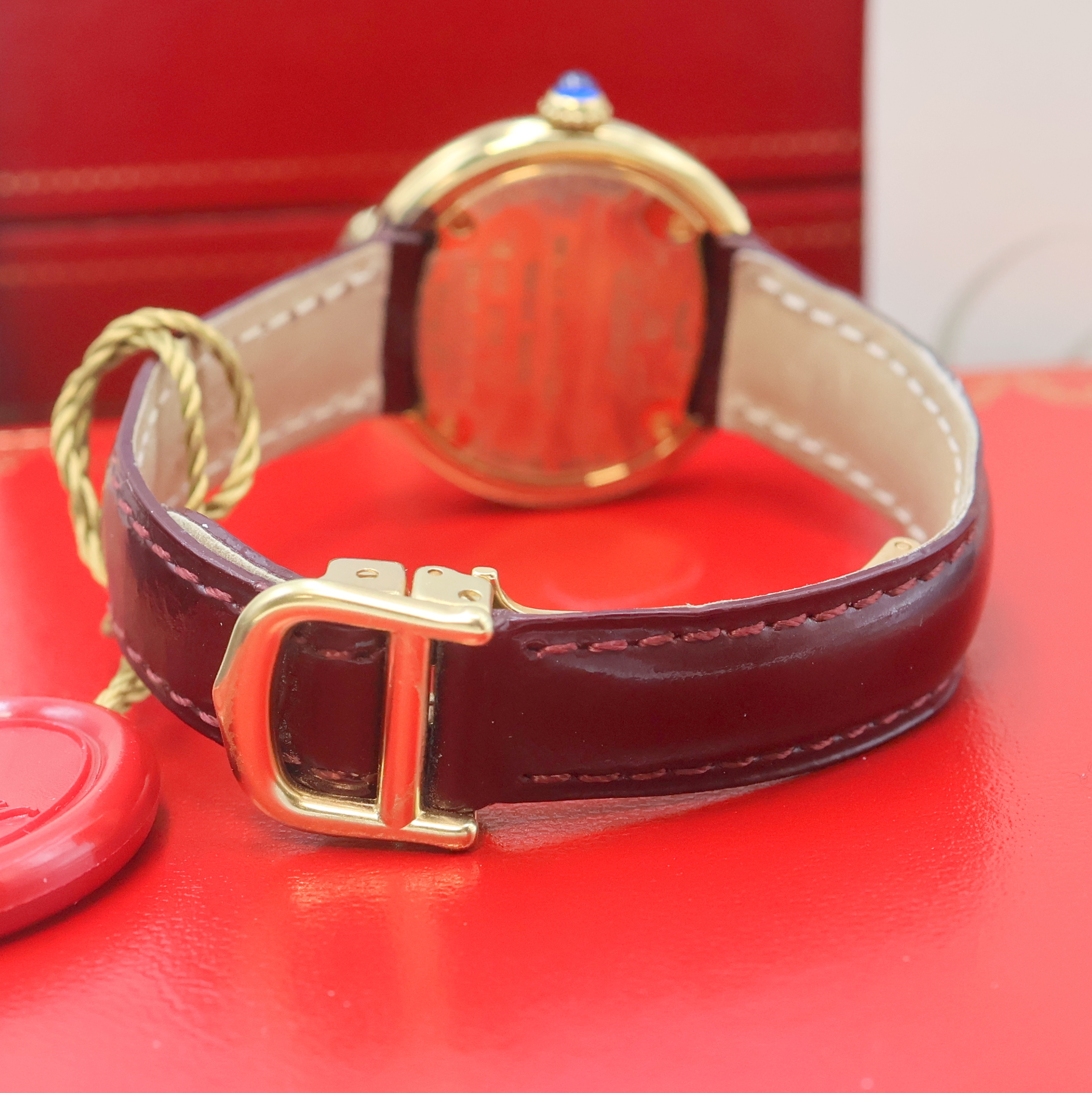 Detail c: CARTIER Trinity Vermeil Damenarmbanduhr Referenz 2735, quarz, verg. Sterlingsilbergeh. inkl. orig. Lederband m. orig. Faltschl., Boden 4-fach ...