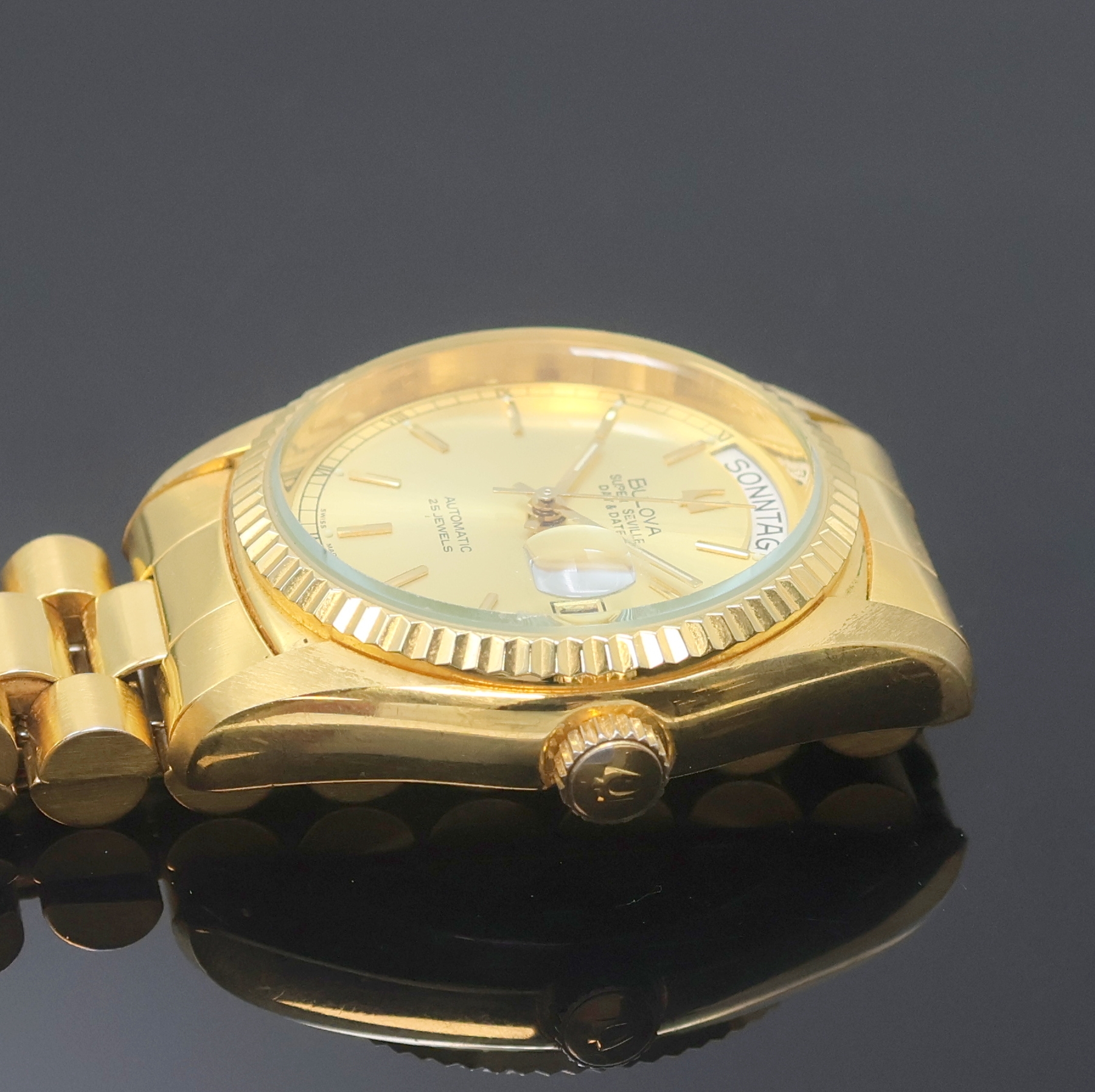 Detail c: BULOVA Super Seville Day & Date Armbanduhr, Schweiz um 1990, Automatik, verg. Geh. inkl. orig. Gliederband m. Faltschl., Stahlboden u. Krone ...
