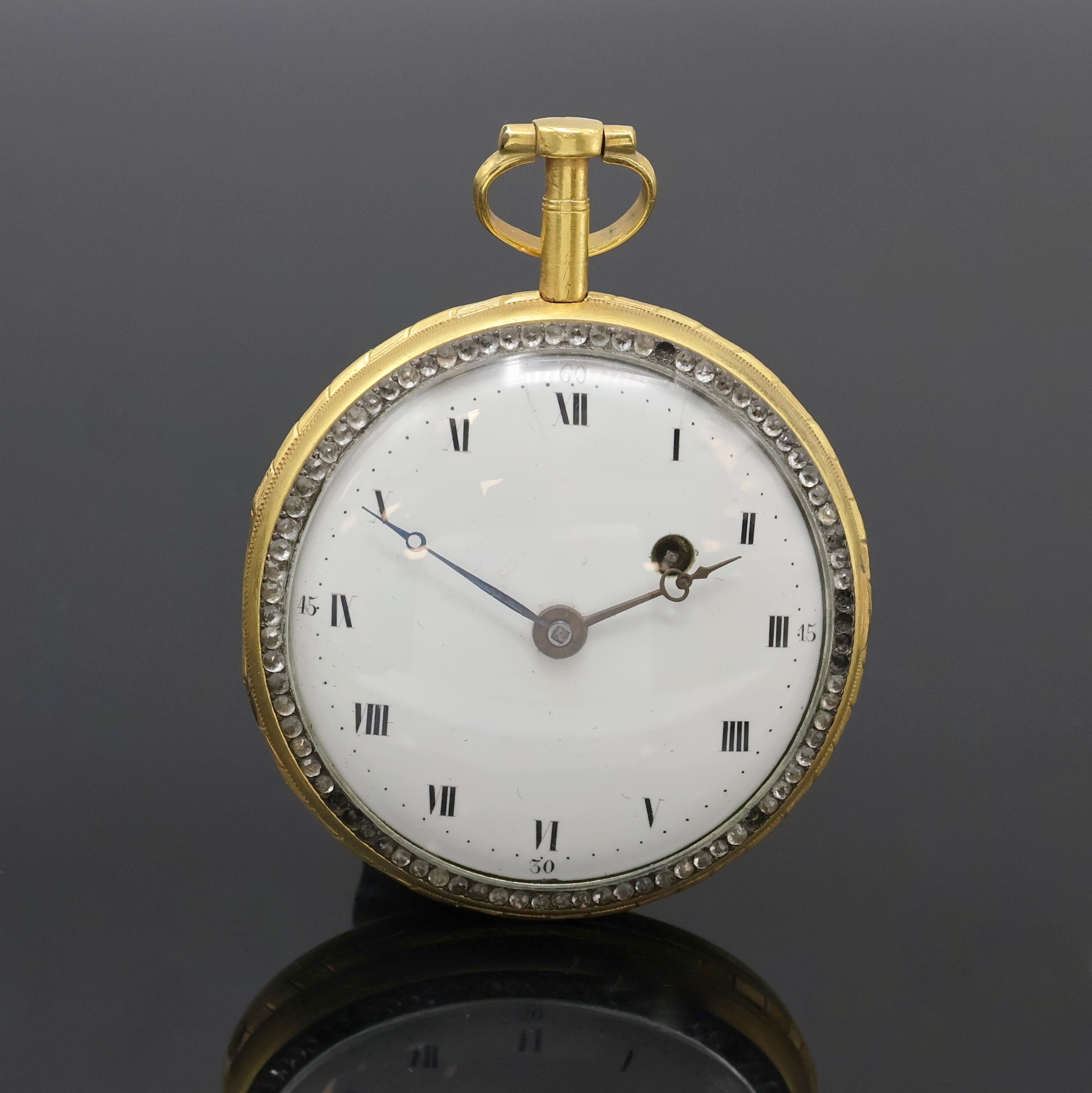 Email-Spindeltaschenuhr, Schweiz um 1790, verg. Geh., rücks. transluzid blau emailliert m. gold./blauen floralen Einlagen besch./rep., Lünette m. ...