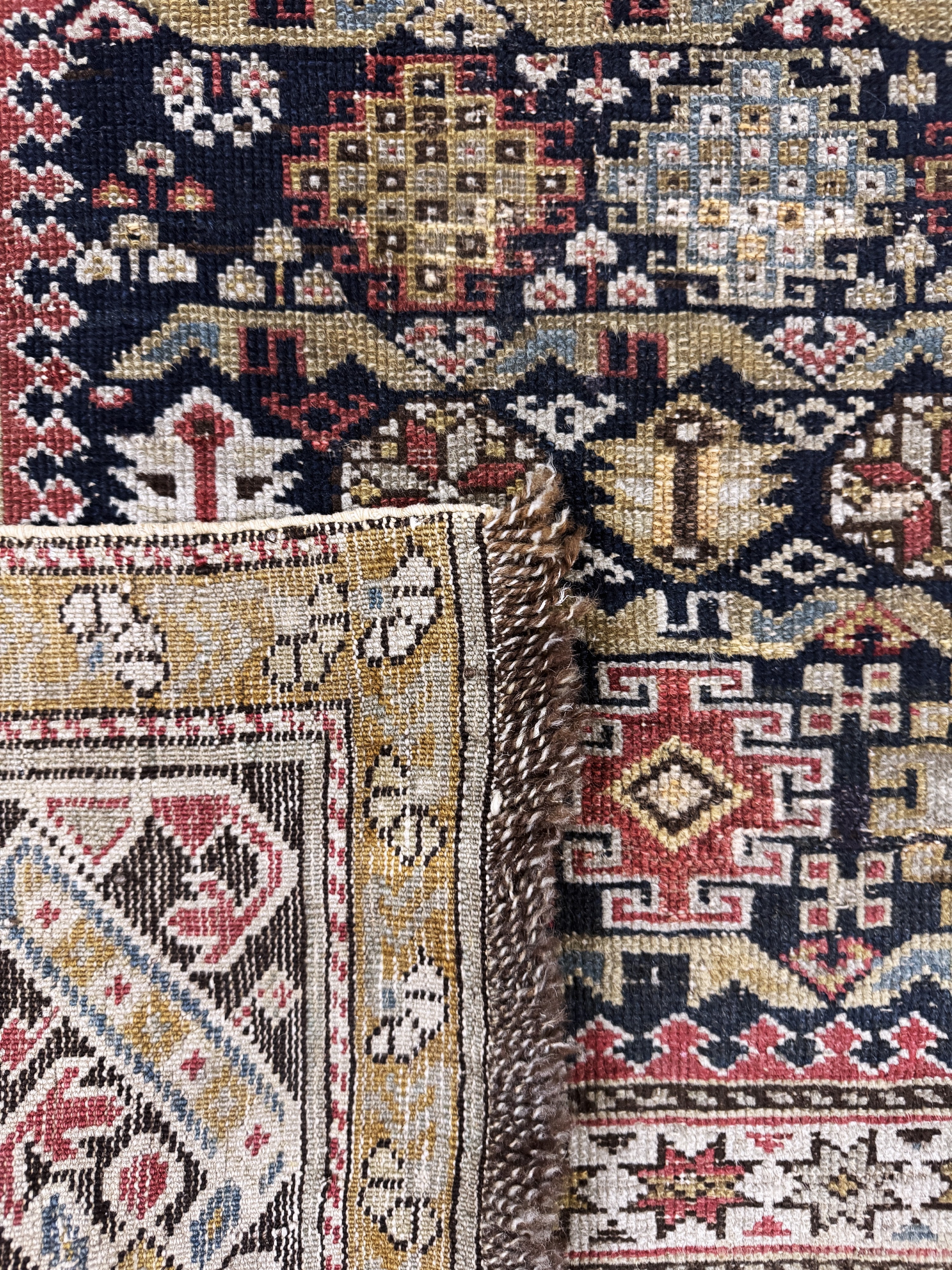 Detail g: "Perpedil"Schirwan antik, Kaukasus, 19.Jhd,Wolle auf Wolle, ca. 170 x 112 cm, EHZ: 3(restauriert)