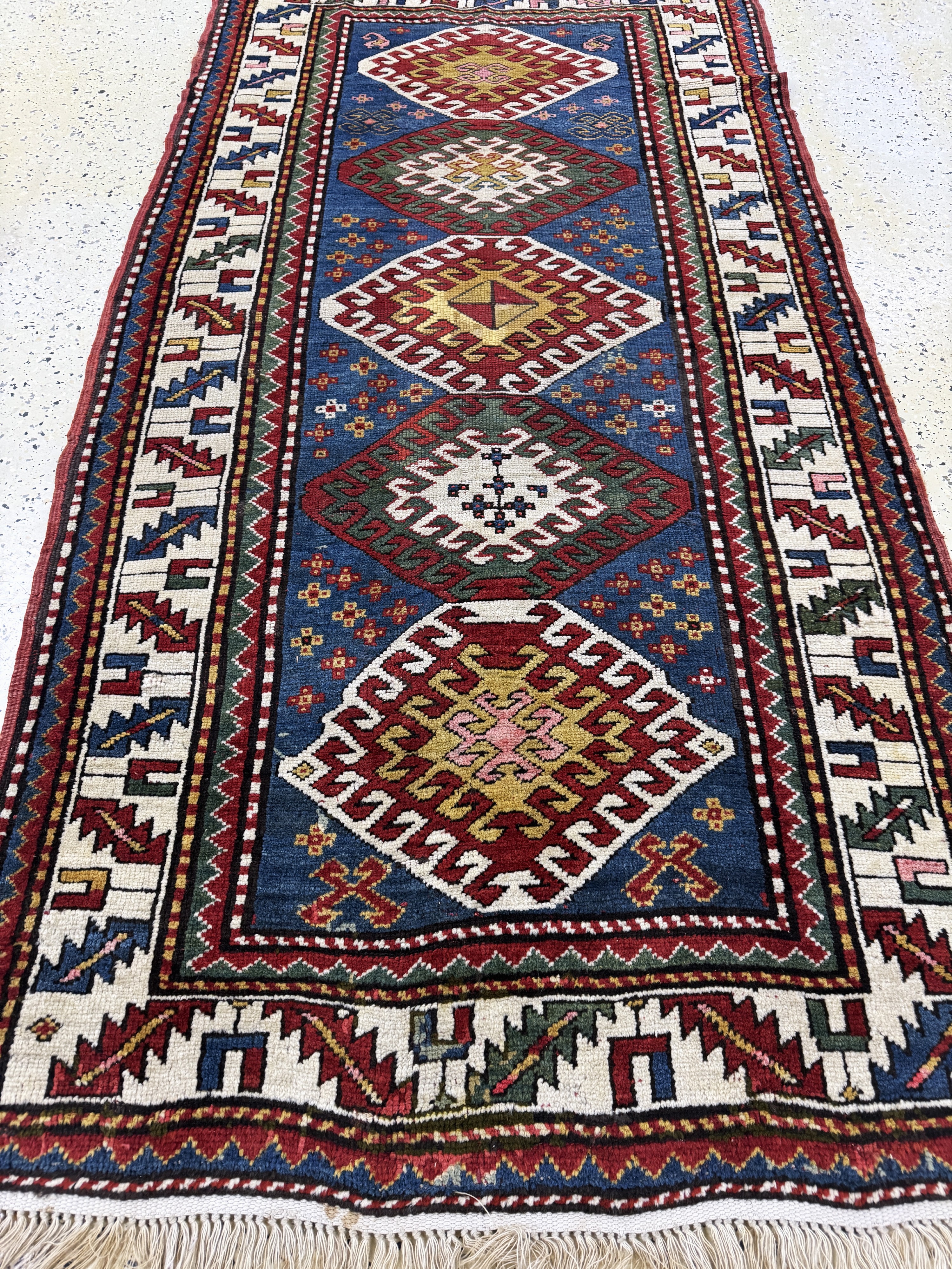 Detail f: Kazak antik, Kaukasus, um 1900, Wolle auf Wolle, ca. 220 x 110 cm, EHZ: 2-3(restauriert)