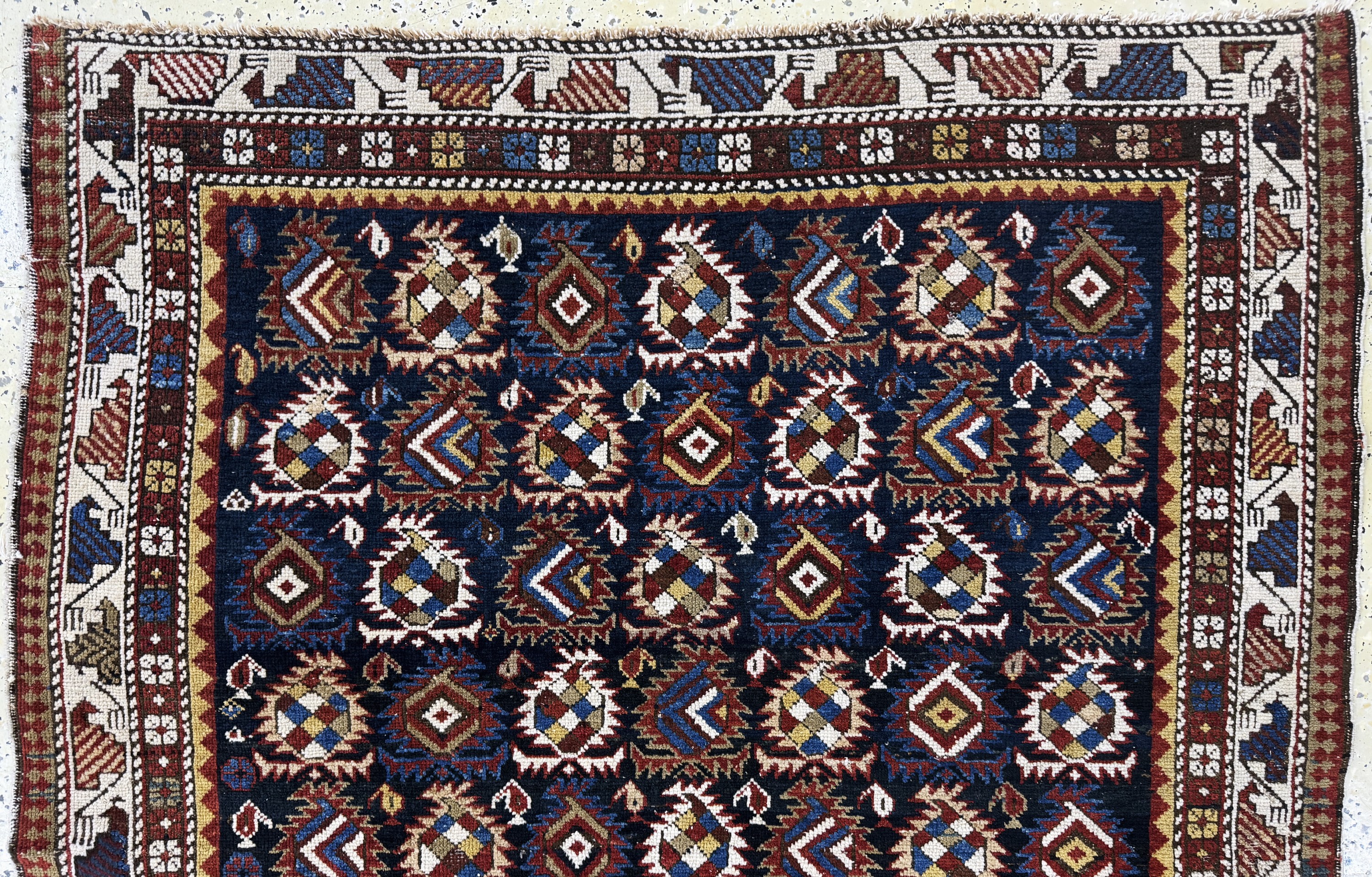 Detail a: Schirwan antik, Kaukasus, 19.Jhd, Wolle aufWolle, ca. 170 x 125 cm, EHZ: 3