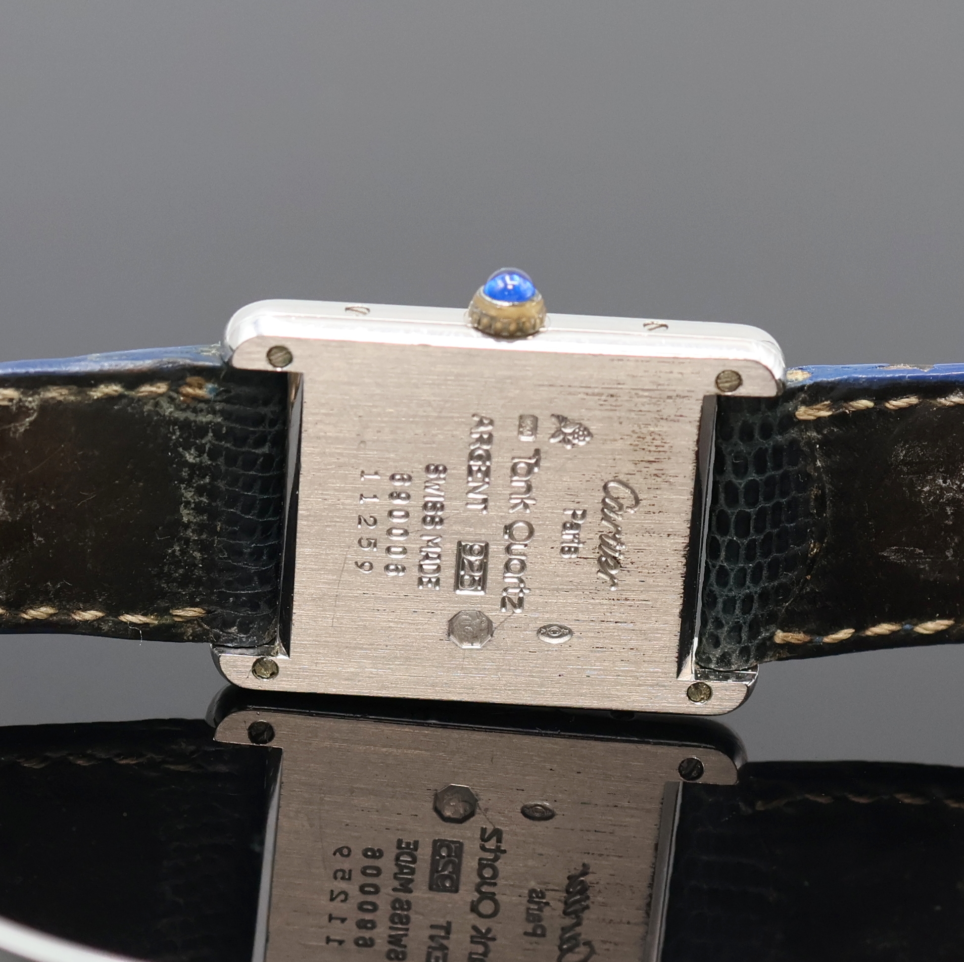 Detail e: CARTIER Armbanduhr Serie Tank in Silber Referenz 690006, Schweiz um 1994, quarz, 4-fach verschr. 925er Silbergeh., Schmuckkrone, creme-farb. Ziffebl. ...