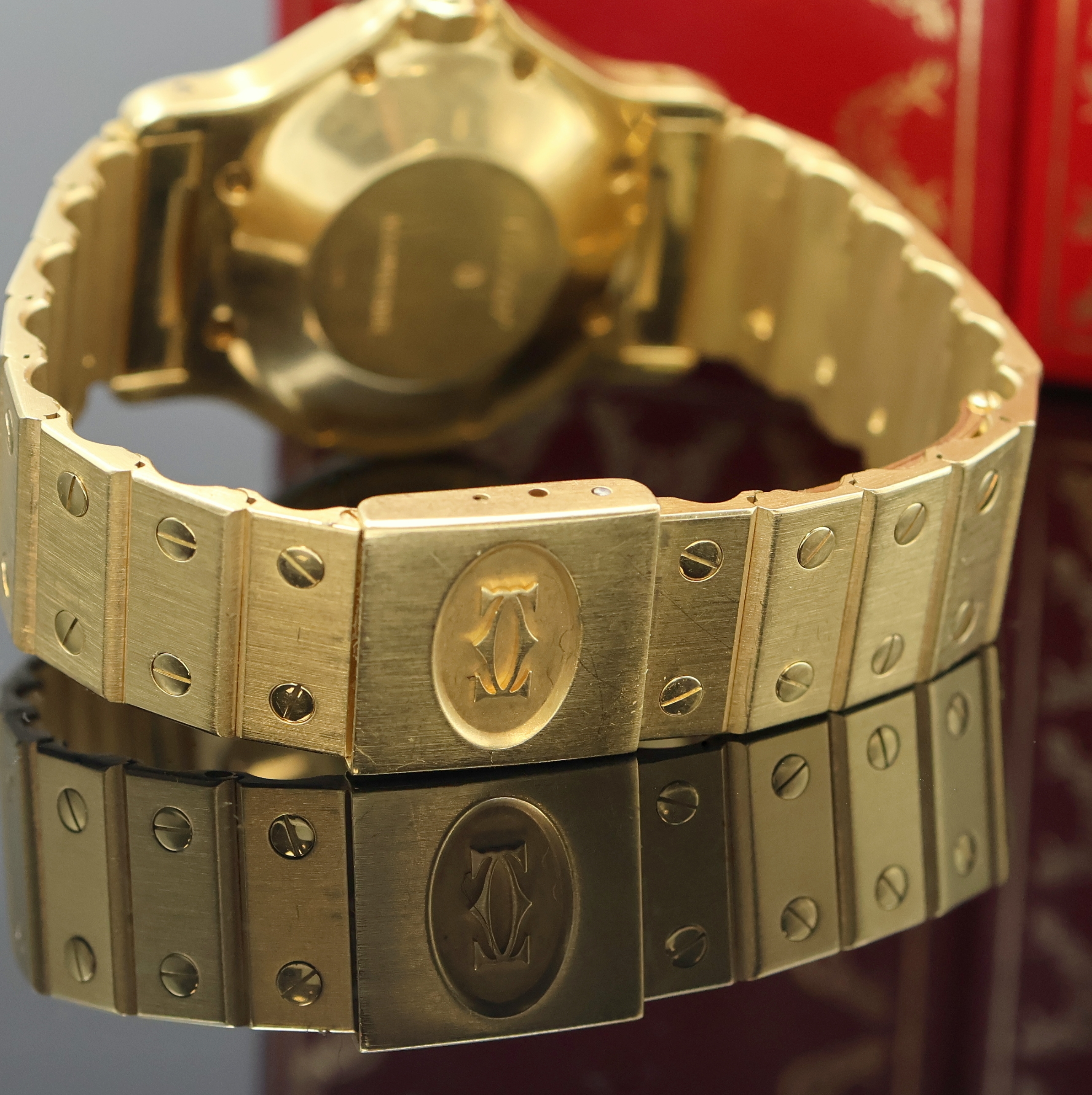 Detail d: CARTIER Santos Octagon Armbanduhr in GG 750/000, Automatik, massives Goldgeh. inkl. Gliederband m. Faltschl., oktagonale Lünette gegen Geh. 8-fach ...