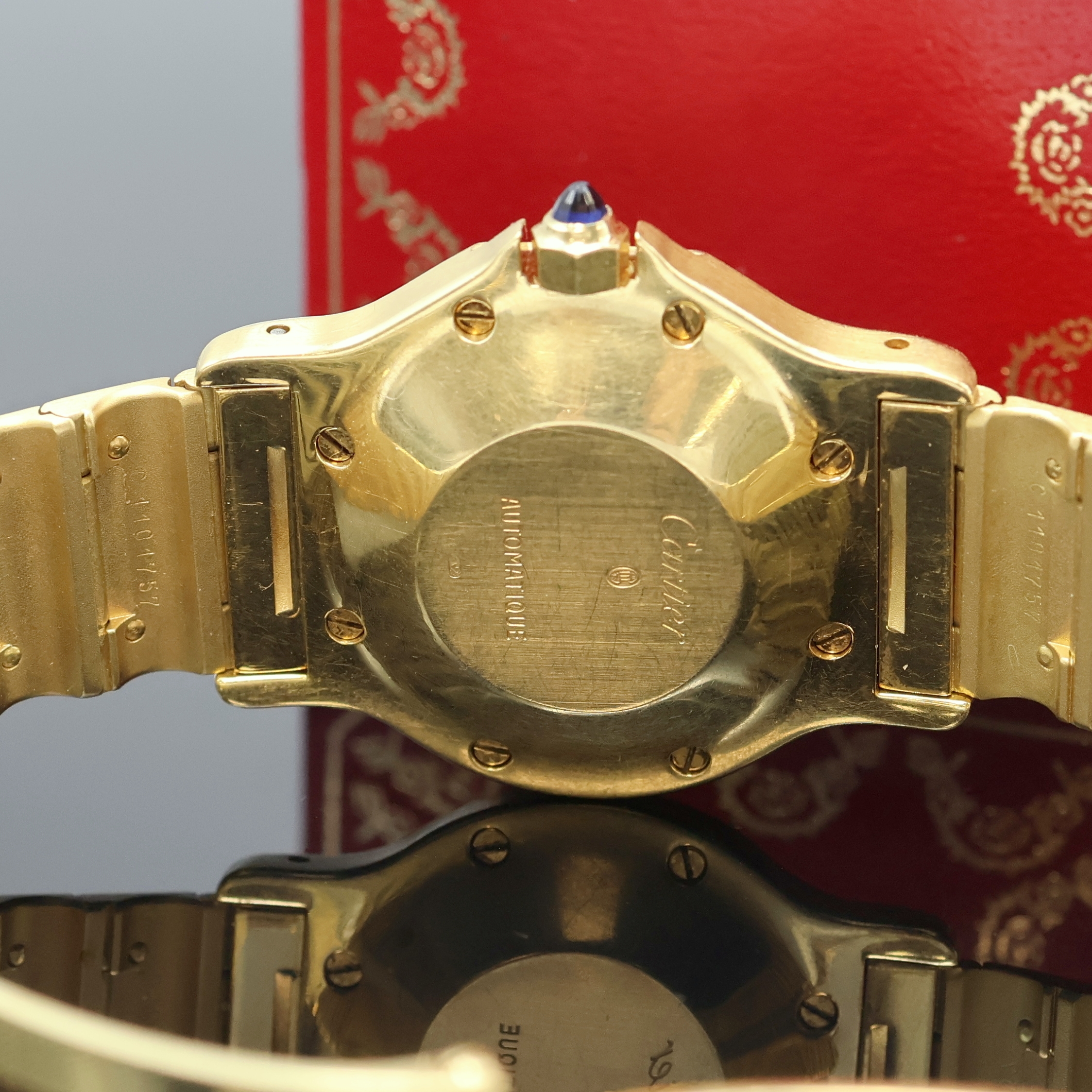 Detail f: CARTIER Santos Octagon Armbanduhr in GG 750/000, Automatik, massives Goldgeh. inkl. Gliederband m. Faltschl., oktagonale Lünette gegen Geh. 8-fach ...