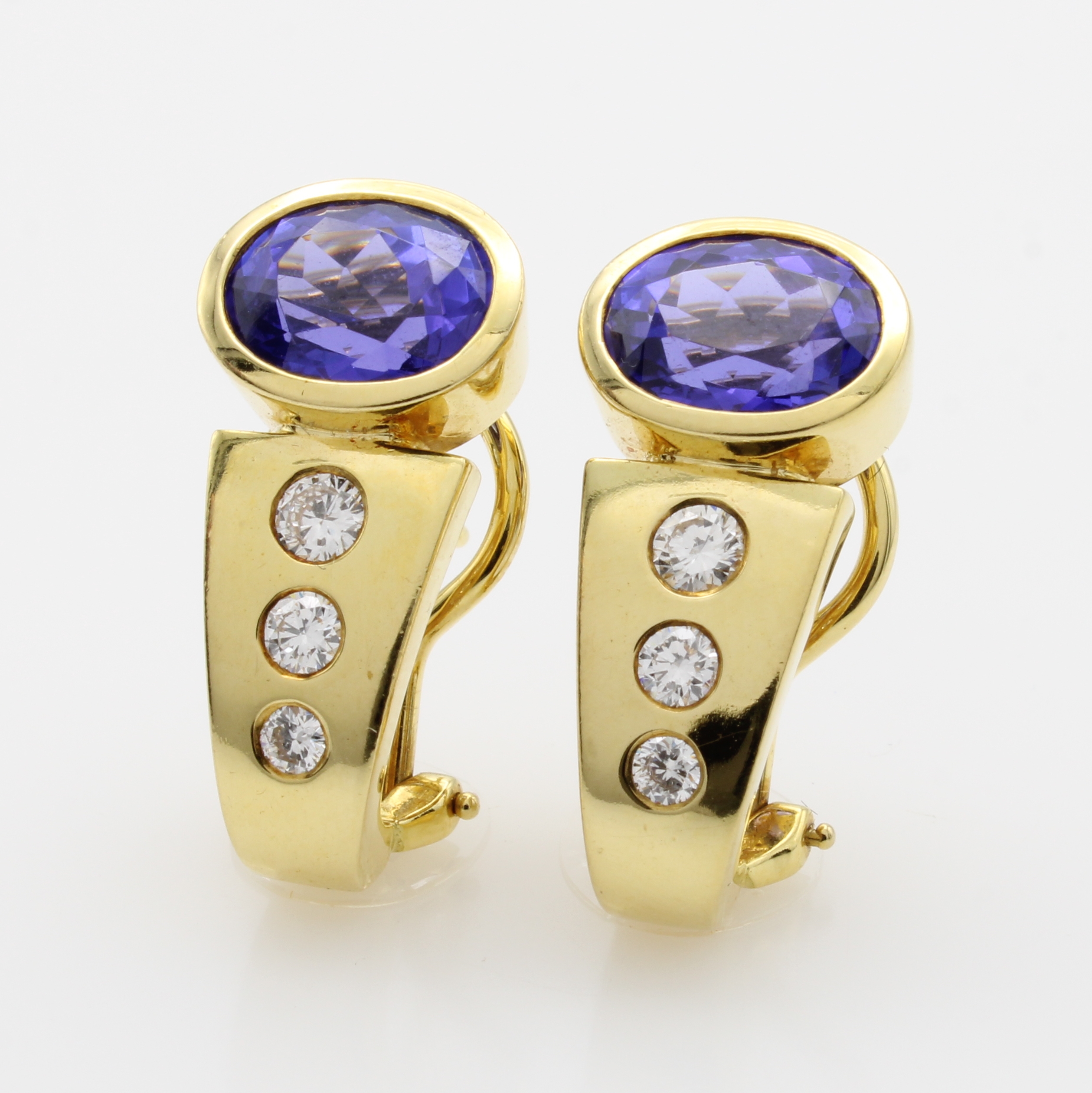 Image 27062865 - Paar Ohrstecker mit Tansaniten und Brillanten, GG 750/000, 2 ovale Tansanite zus. ca. ...