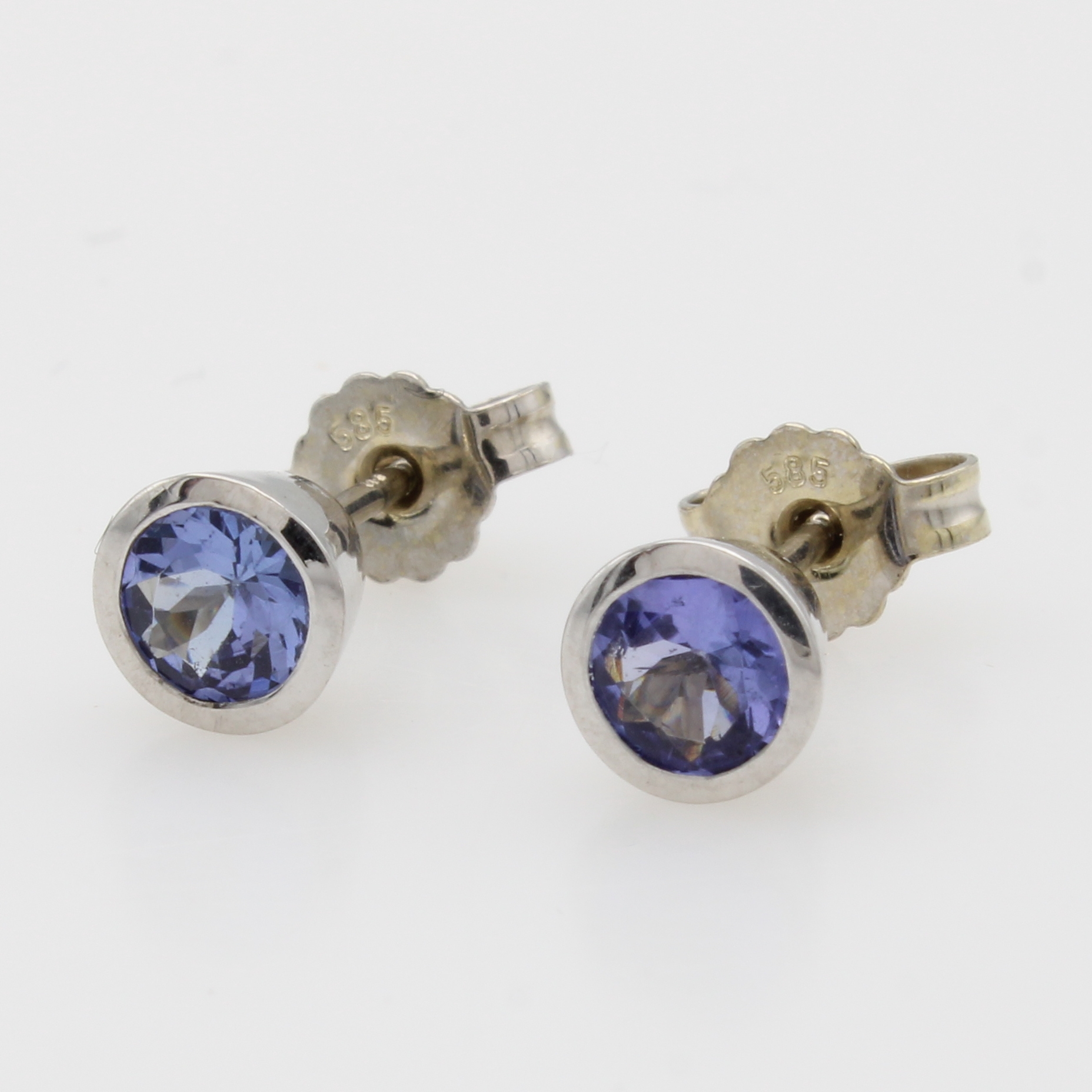 Image 27062877 - Paar Ohrstecker mit Tansaniten, WG 585/000, 2 Tansanite in Zargenfassungen zus. ca. 0.95 ...
