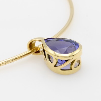 27062887b - Anhänger mit Tansanit an Omegareif, GG 750/ 000, Tansanittropfen v. sehr schöner Farbe ...