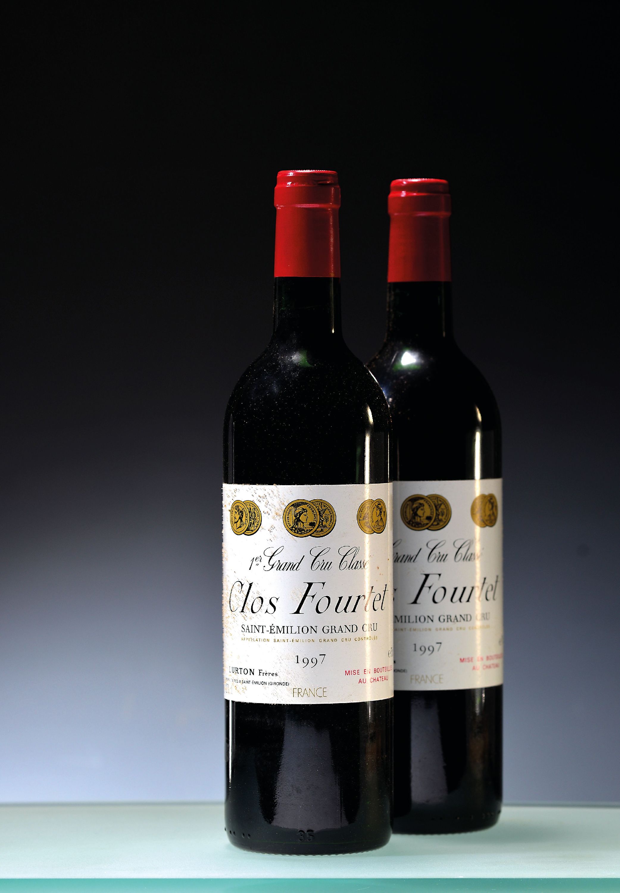 Image 27063045 - 12 Flaschen 1997 Clos Fourtet, St. Emilion Grand Cru, je ca. 750ml, 12 Flaschen in orig. ...