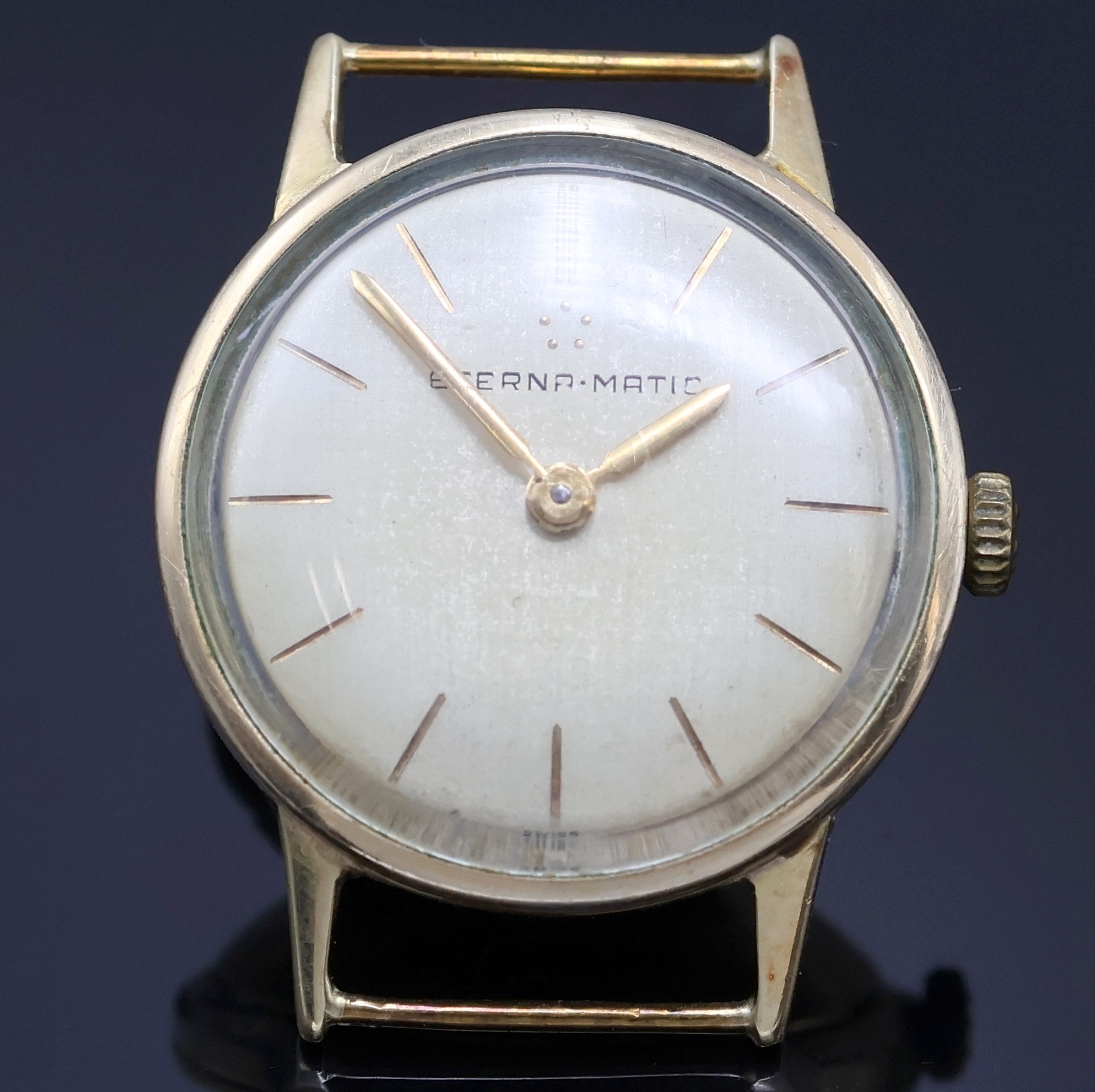Detail b: ETERNA-MATIC 2 vergoldete Armbanduhren, Schweiz um 1950/1960, Automatik, 1x Stahlboden verschr., 1x verg. Boden aufgedr., silb. Blätter pat., gold. ...