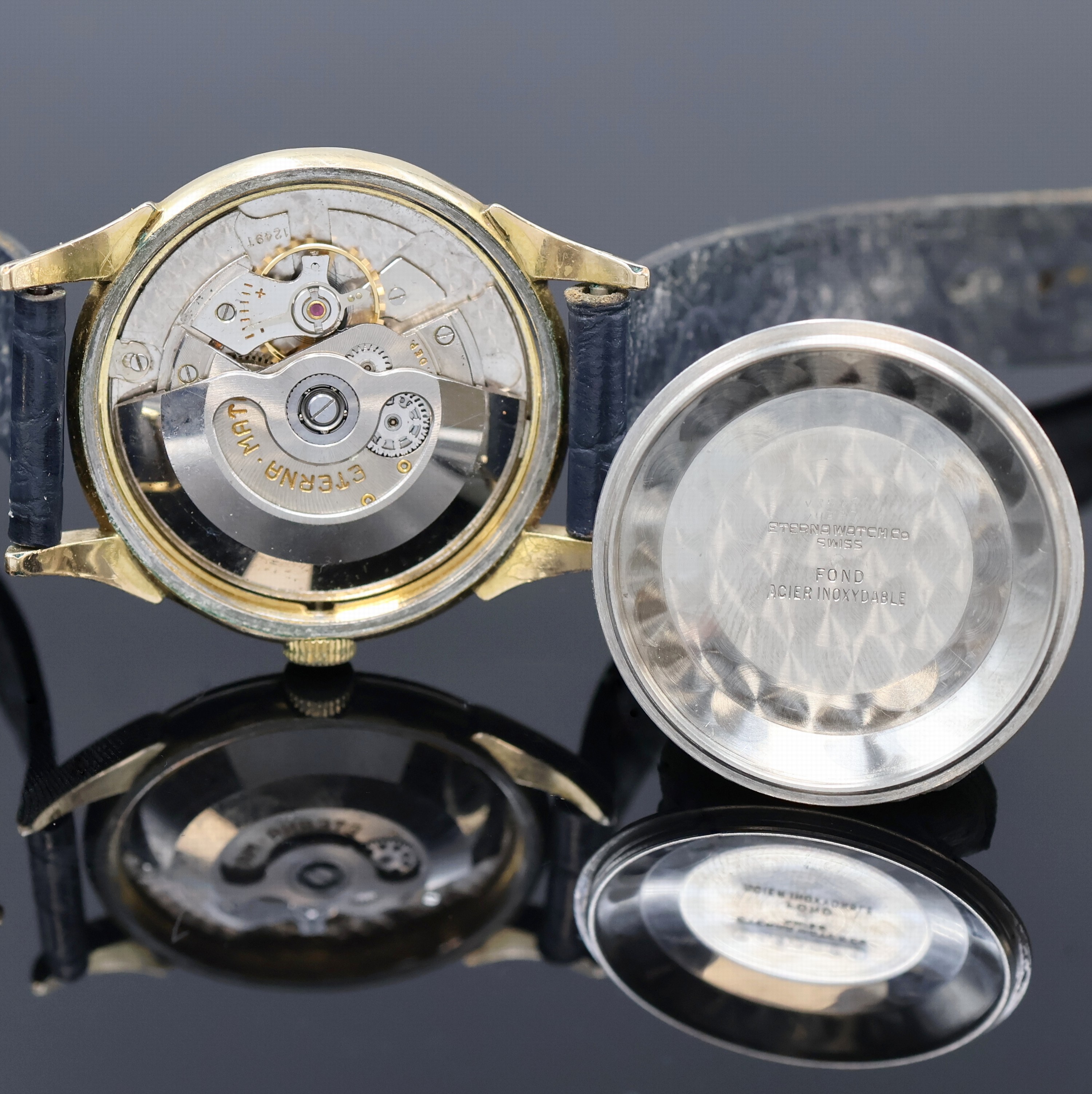 Detail f: ETERNA-MATIC 2 vergoldete Armbanduhren, Schweiz um 1950/1960, Automatik, 1x Stahlboden verschr., 1x verg. Boden aufgedr., silb. Blätter pat., gold. ...