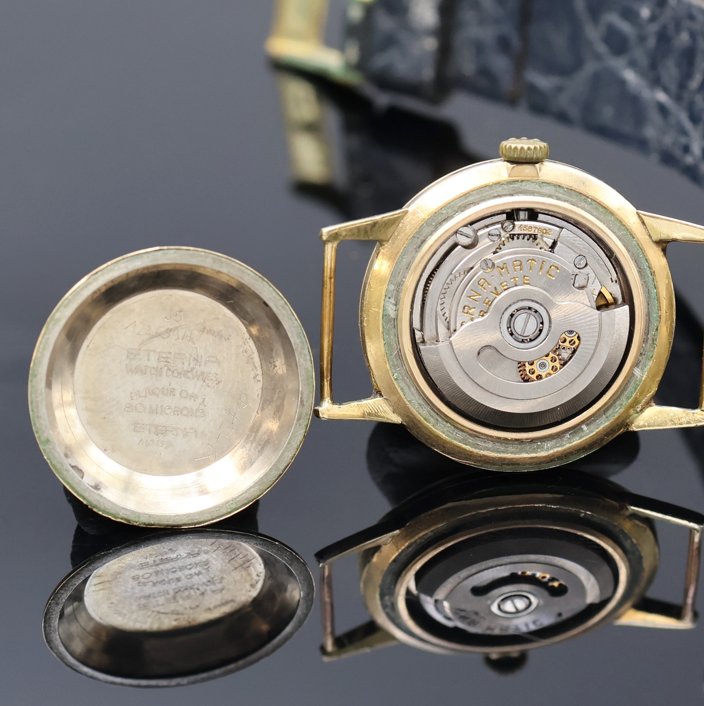Detail g: ETERNA-MATIC 2 vergoldete Armbanduhren, Schweiz um 1950/1960, Automatik, 1x Stahlboden verschr., 1x verg. Boden aufgedr., silb. Blätter pat., gold. ...