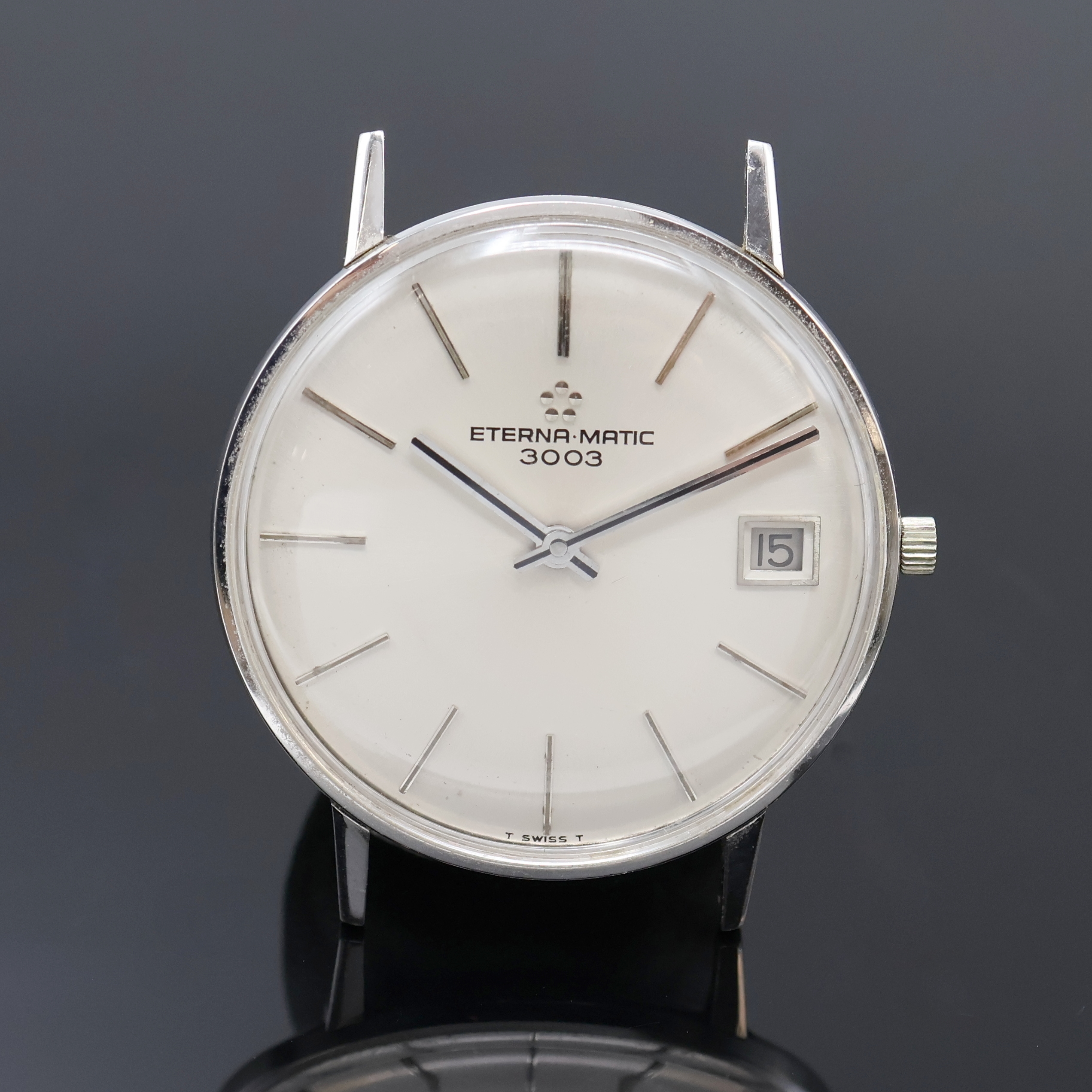Detail a: ETERNA-MATIC 3003 Herrenarmbanduhr in WG 750/000 Referenz 844, Schweiz um 1970, Automatik, Boden aufgedr., silb. Zifferbl. m. Tritium-Leuchtind., ...