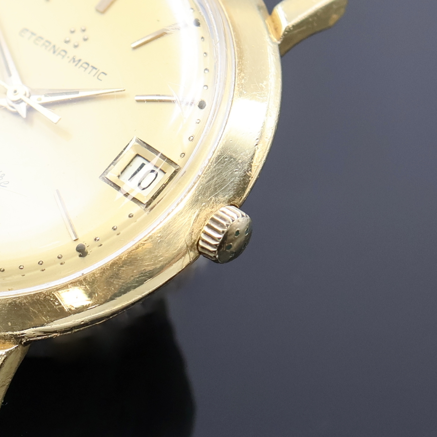 Detail b: ETERNA-MATIC Centenaire Armbanduhr in GG 750/000, Schweiz um 1965, Automatik, Boden aufgedr., silb. Zifferbl. pat., gold. Std.- Ind., gold. ...