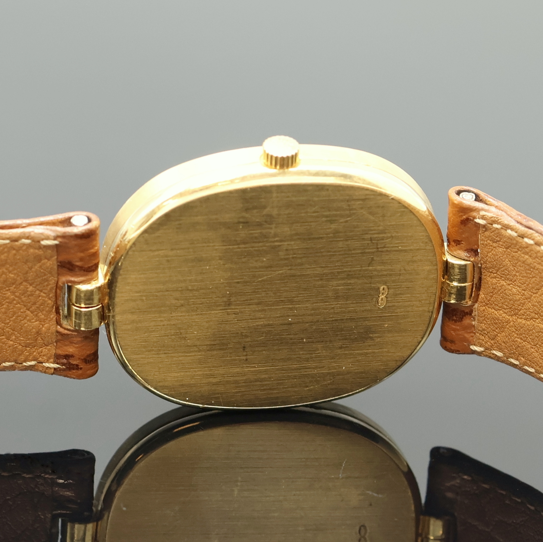 Detail d: PATEK PHILIPPE Ellipse Armbanduhr in GG 750/000 Referenz 3930, Schweiz um 1990, quarz, 2-tlg. Geh., Boden aufgedr., orig. Lederband m. orig. GG ...