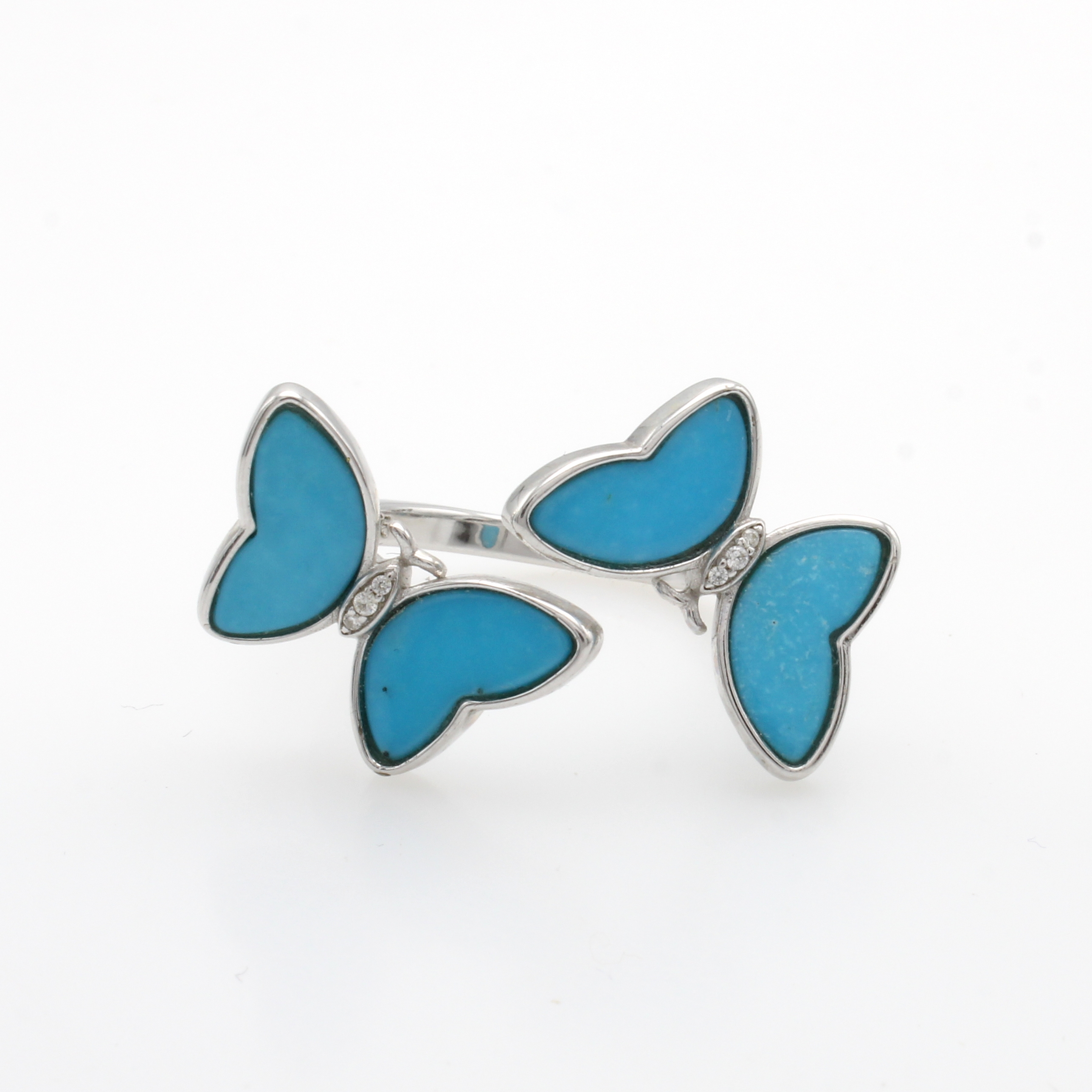 Image 27064228 - Ring ´Schmetterlinge´ mit Türkisen, Silber 925/000, z.T. offen gearb., RW ca. 55