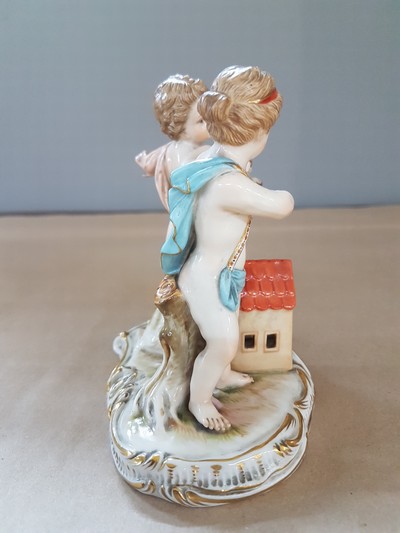 27064883b - Porcelain group, Meissen, around 1850-1924, pair of putti with rabbit and little house, ...