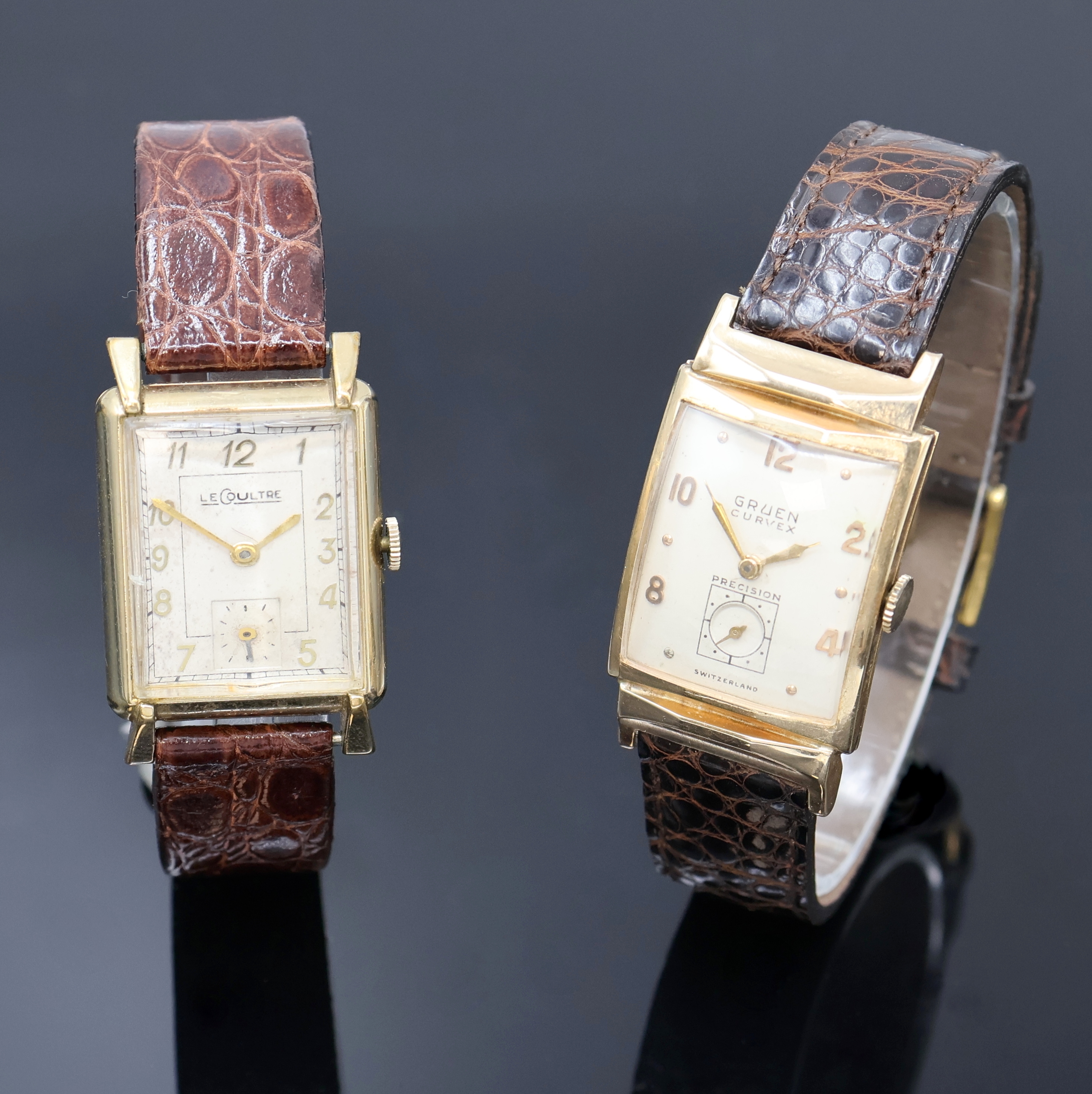 LeCoultre und Gruen 2 Armbanduhren, Schweiz/USA um 1940/50, LeCoultre 2-teil. Goldfilled Geh., Boden mit Widmungsgravur aufgedr., silb. Zifferbl. ...