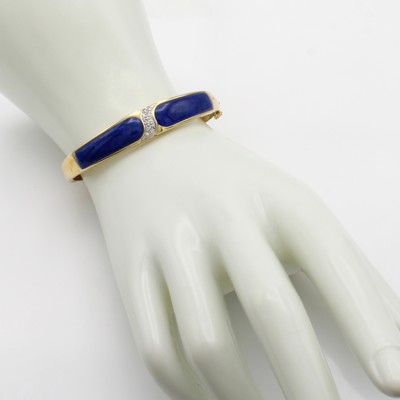 27066682a - Armreif mit Lapislazuli und Brillanten, GG 585/000, Brill. mittig gef. zus. ca. 0.10 ct ...