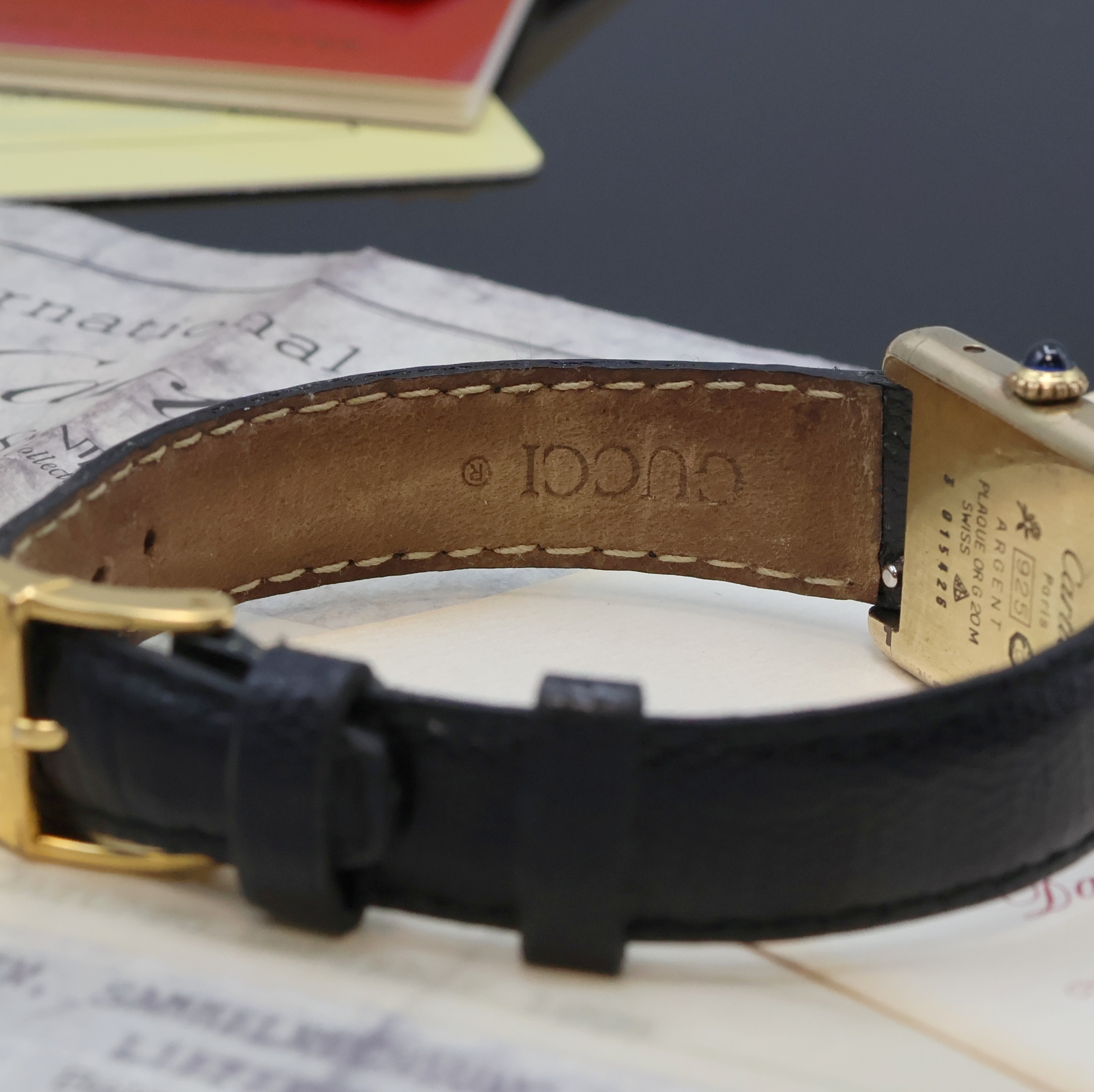 Detail c: CARTIER Tank Damenarmbanduhr in vergoldeten Sterlingsilber-Gehäuse, Handaufzug, rechteck. Geh. seitl. 4-fach verschr., schwarzes Zifferbl., gold. ...