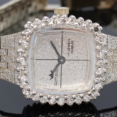 27069080a - AMARA diamantbesetzte Damenarmbanduhr in WG 585/000, Schweiz um 1970, Handaufzug, 2-tlg. ...
