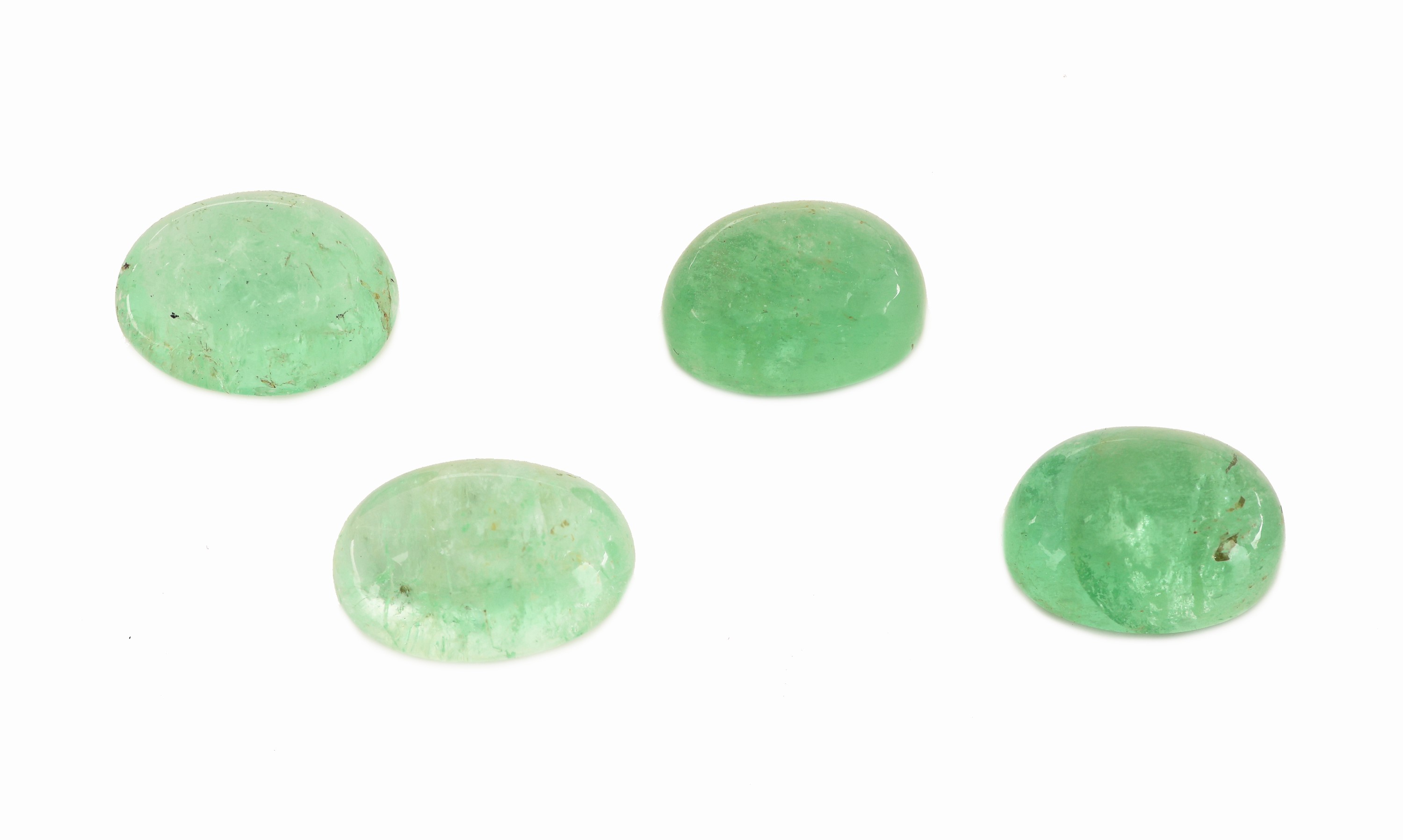 Lot 4 lose Smaragd-Cabochons zus. ca. 46.07 ct