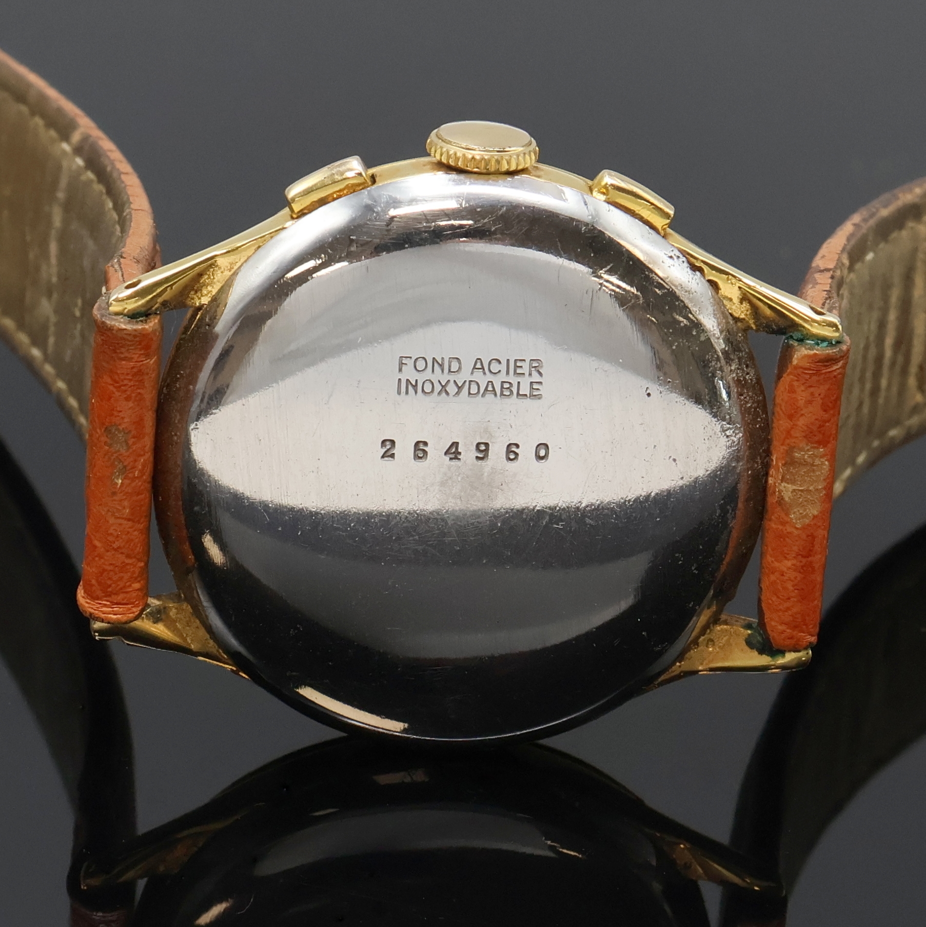 Detail c: CHRONOGRAPHE SUISSE vergoldeter Armbandchronograph, Schweiz um 1950, Handaufzug, Stahlboden aufgedr., silb. Zifferbl. rest., arab. Zahlen u. gold. ...