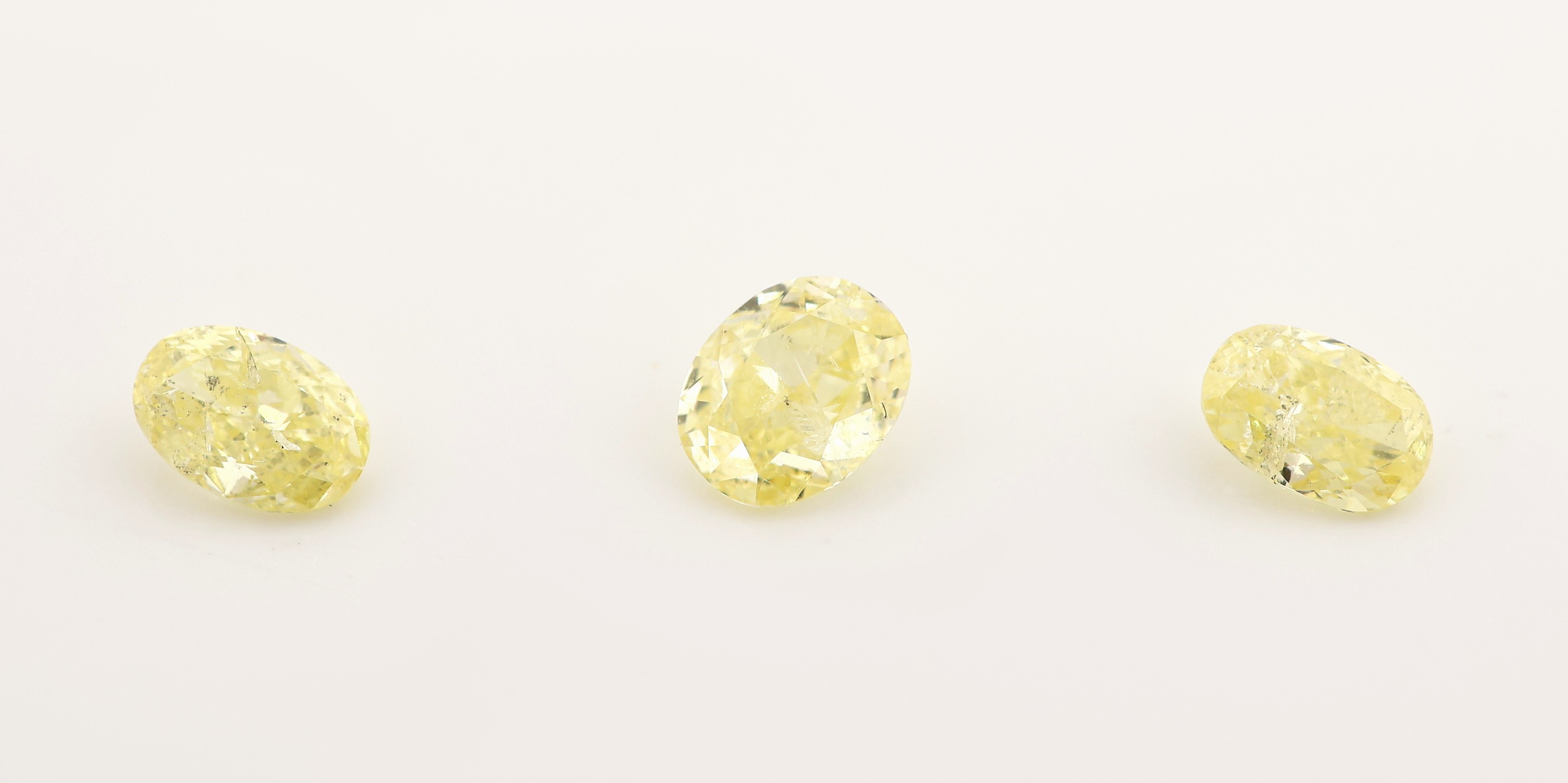 Image 27069987 - Lot 3 lose ovalfacett. Diamanten zus. ca. 1.41ct Natural Fancy to Vivid Yellow/si2-3, ...