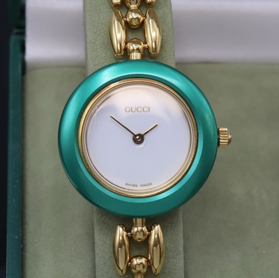 27069968b - GUCCI vergoldete Damenarmbanduhr mit Wechsel-Lünetten Referenz 11/12.2, Schweiz um ...