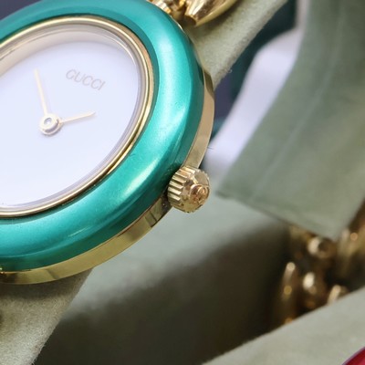 27069968c - GUCCI vergoldete Damenarmbanduhr mit Wechsel-Lünetten Referenz 11/12.2, Schweiz um ...