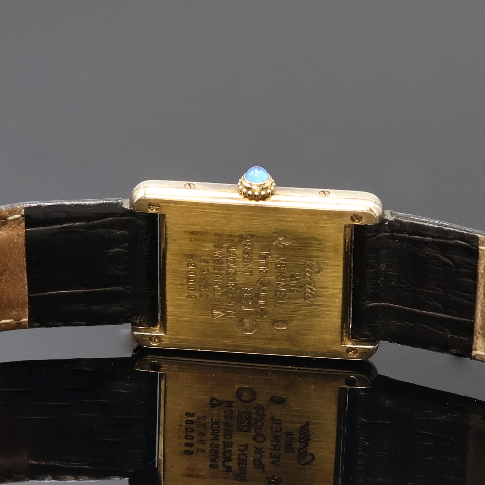 Detail d: CARTIER Damenarmbanduhr Tank Vermeil Referenz 590005, Schweiz um 1995, quarz, 2-teil., verg. Silbergeh. ber., Lederband m. orig. Faltschl., Boden ...