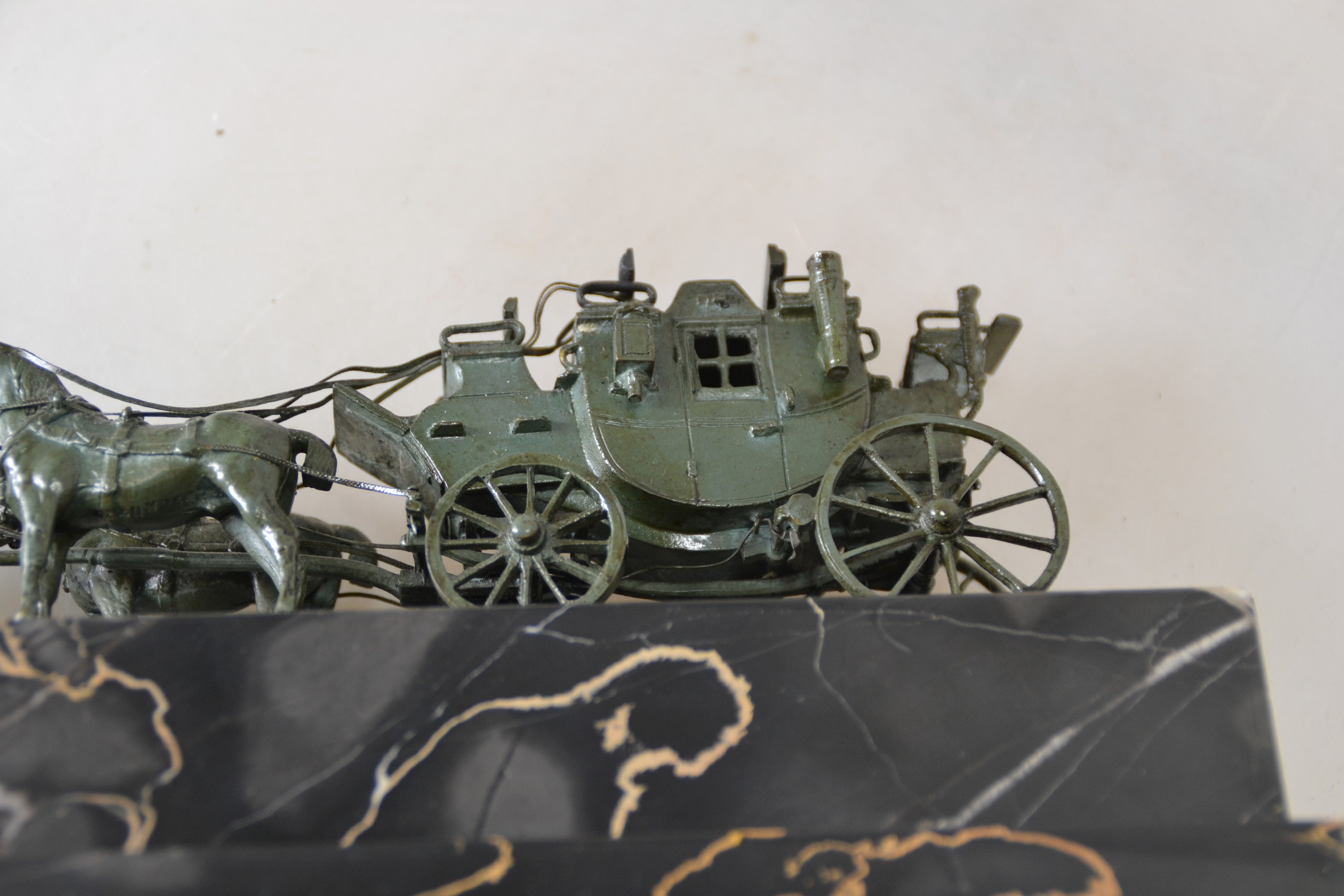 Detail f: Vierspänner/Kutsche, Wiener Bronze, wohl Bergmann, Kutsche, bez. geschützt und num. 4472 und Austria, patiniert, auf rechteckigem Marmorsockel, ca. ...