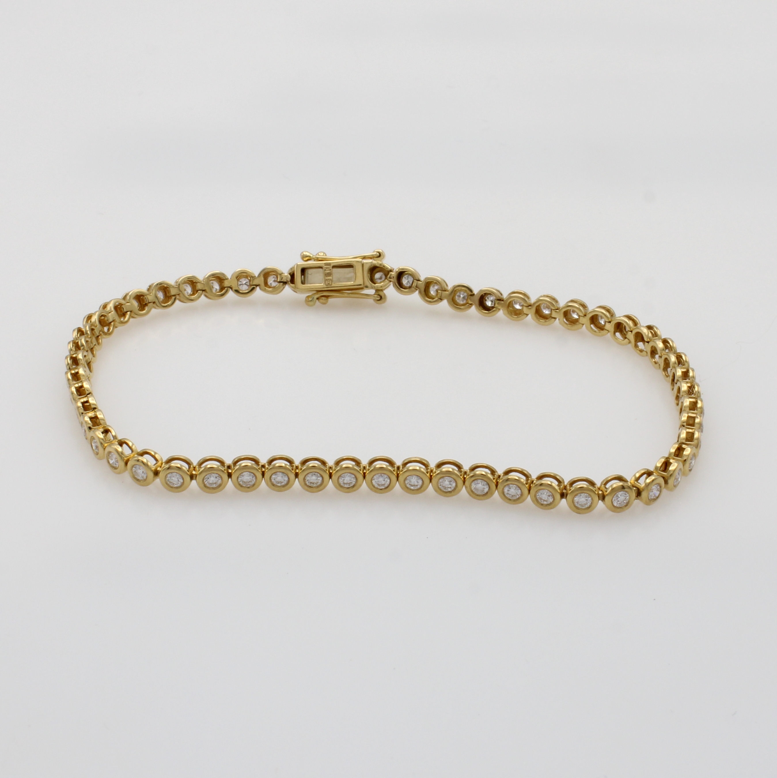 Image 27070623 - Tennisarmband mit Brillanten, GG 750/000, 56Brill. in Zargenf. zus. ca. 1.04 ct feines ...