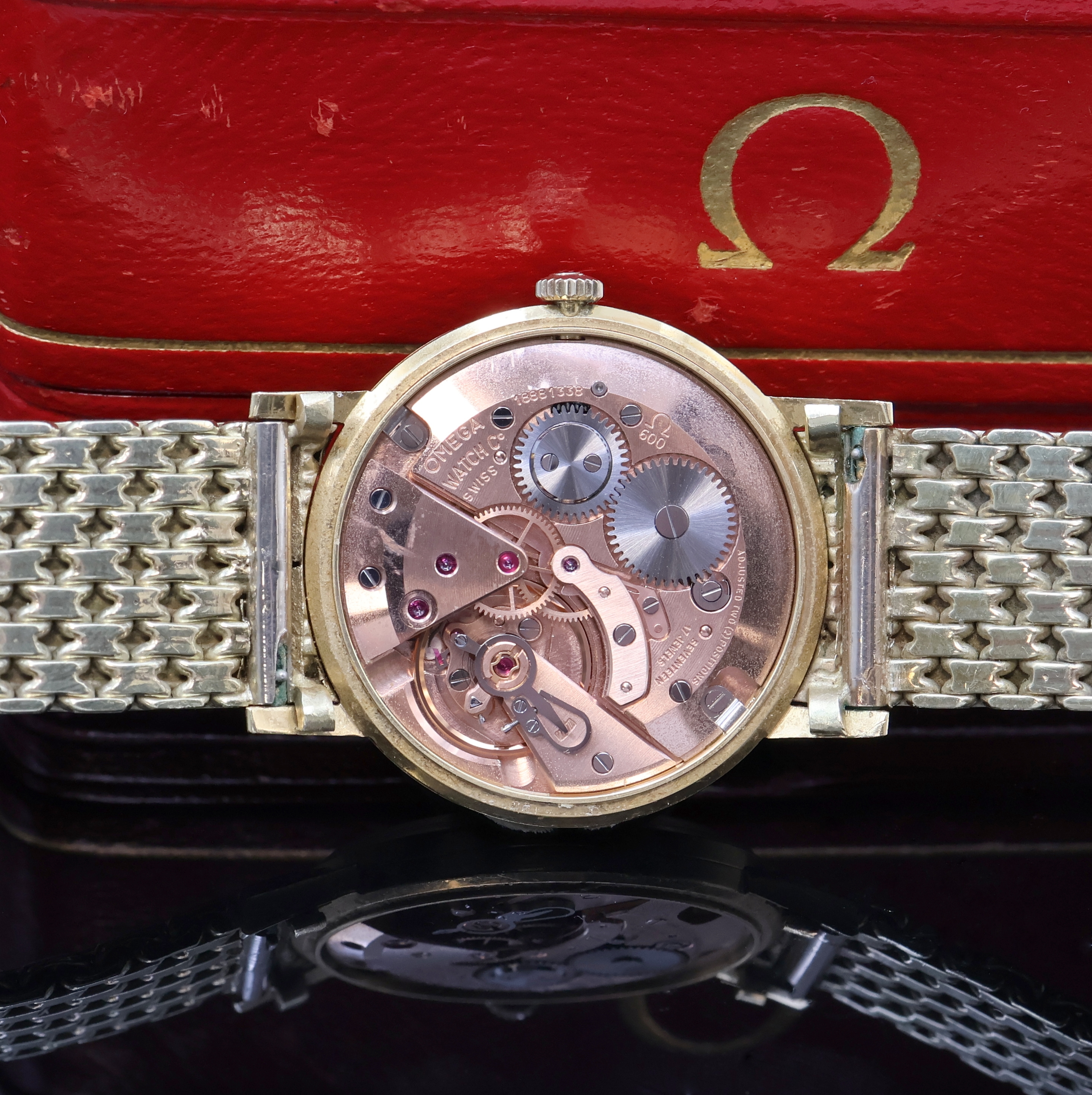 Detail g: OMEGA Herrenarmbanduhr in GG 585/000 Referenz 14756SC-61, Schweiz um 1963, Handaufzug, Boden aufgedr., orig. Goldband m. Faltschl., orig. Krone u. ...