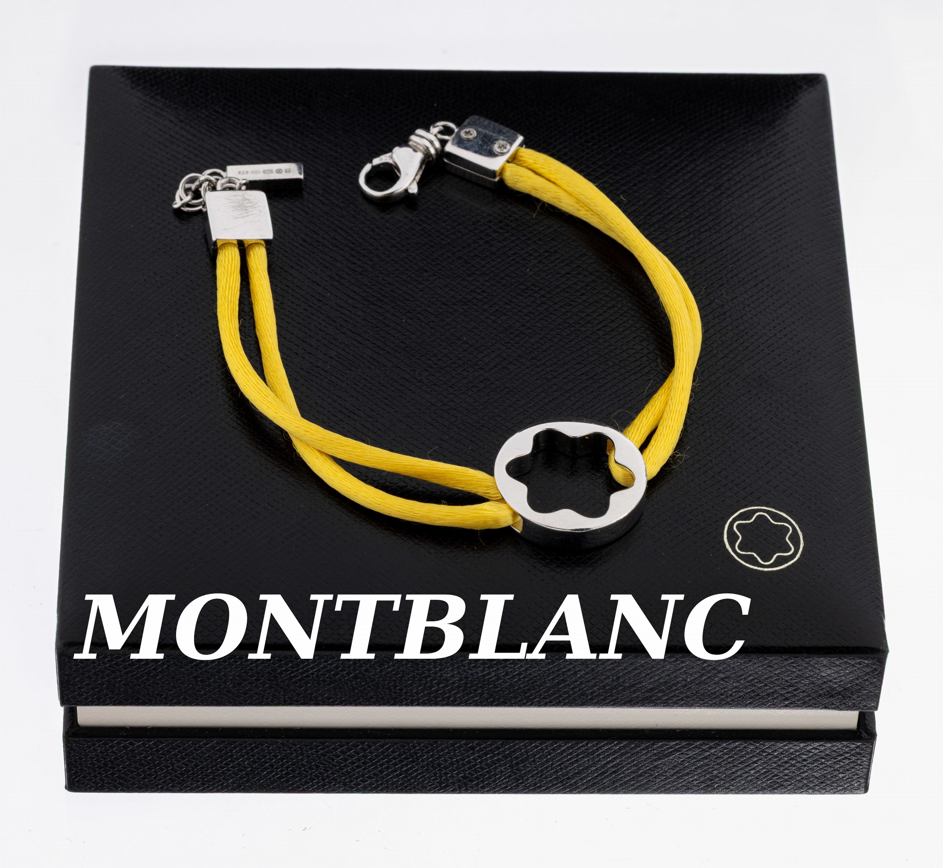 Image 27071859 - MONTBLANC Armband, Stern und Verschluss aus925er Silber, an gelbem 2 rhg. Satinband, L. ...