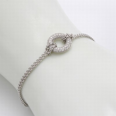 27071902a - 2-reihiges Armband mit Brillanten, WG 585/ 000, kreisförm. Mittelteil, Brill. zus. ca. ...