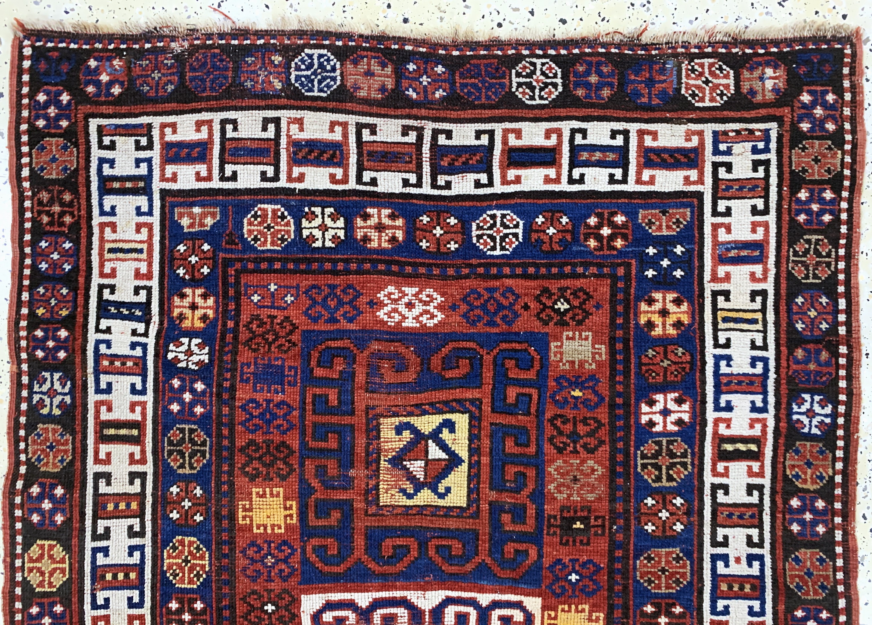 Detail a: Antiker Kazak, Kaukasus, datiert 1322(1900), Wolle auf Wolle, ca. 210 x 110 cm,EHZ: 3