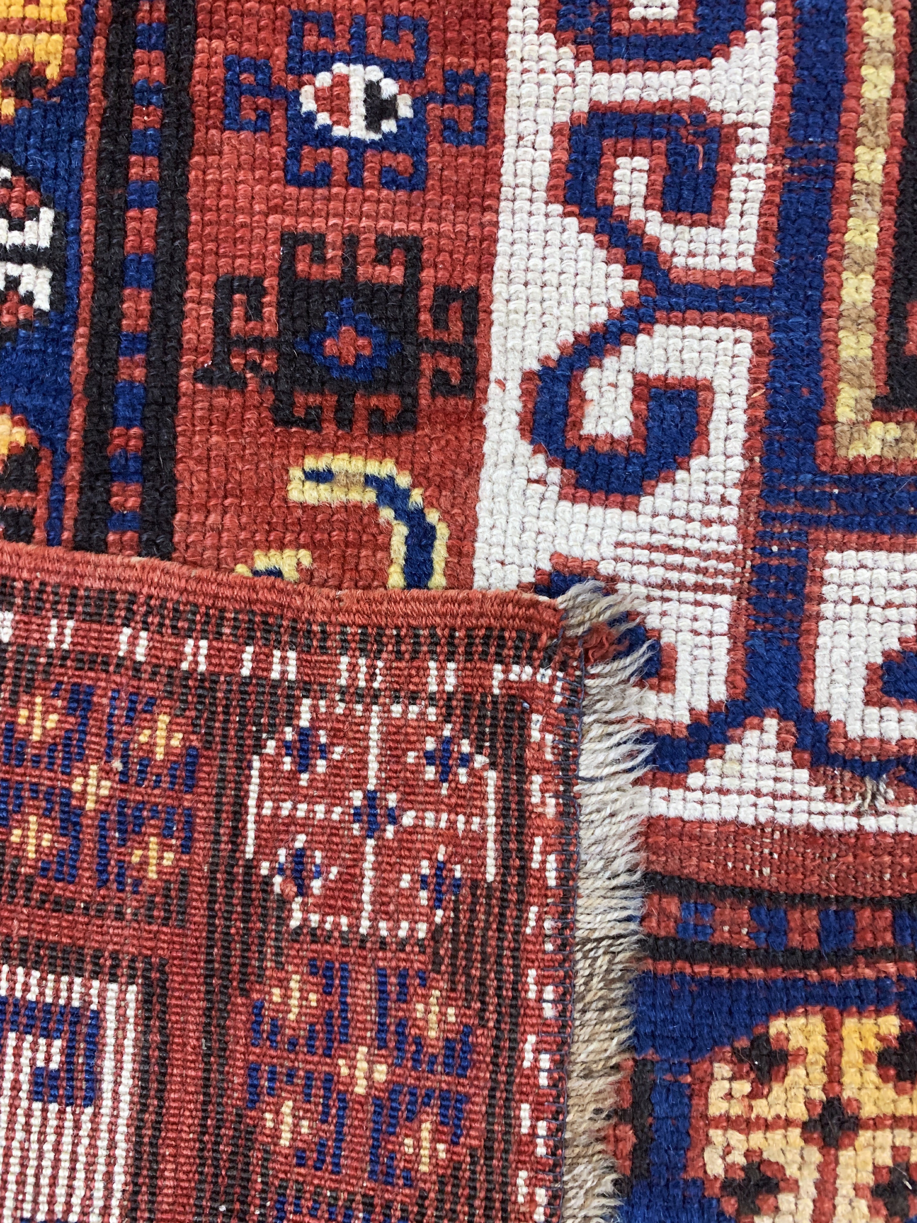 Detail e: Antiker Kazak, Kaukasus, datiert 1322(1900), Wolle auf Wolle, ca. 210 x 110 cm,EHZ: 3