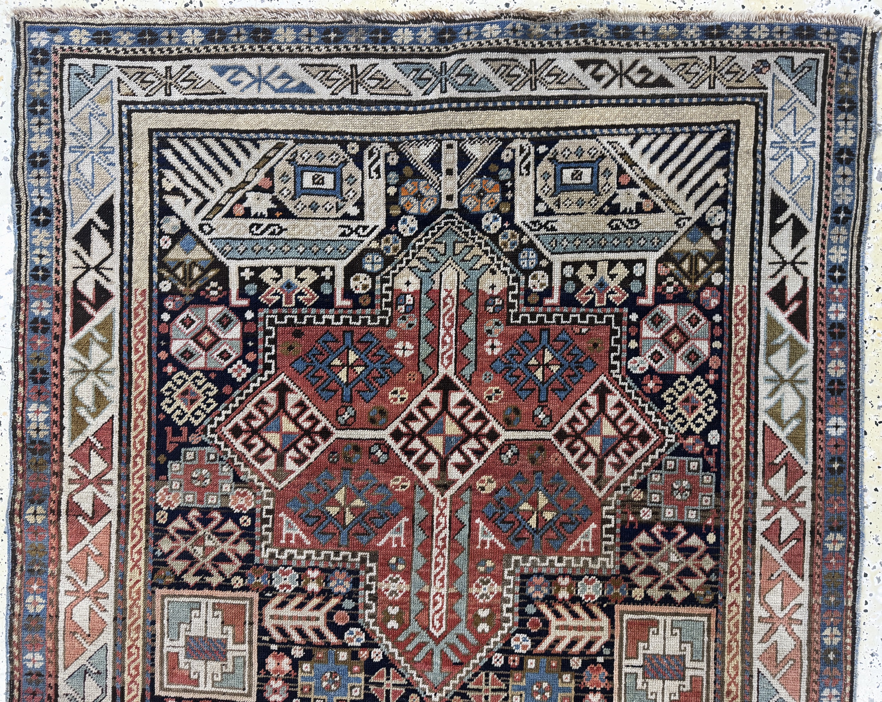 Detail a: Antiker Kazak"Akstafa", Kaukasus, 19.Jhd, Wolle auf Wolle, ca. 285 x 120 cm, EHZ: 3(restauriert)